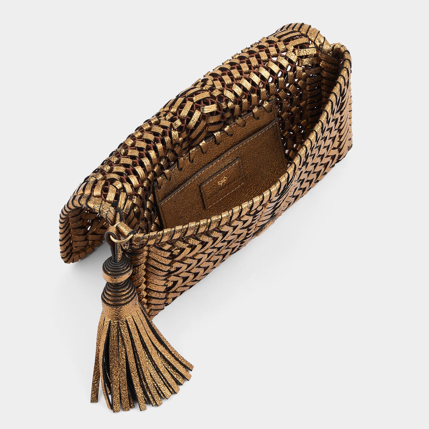 Neeson Tassel Clutch -

                  
                    Metallic Leather in Bronze -
                  

                  Anya Hindmarch UK
