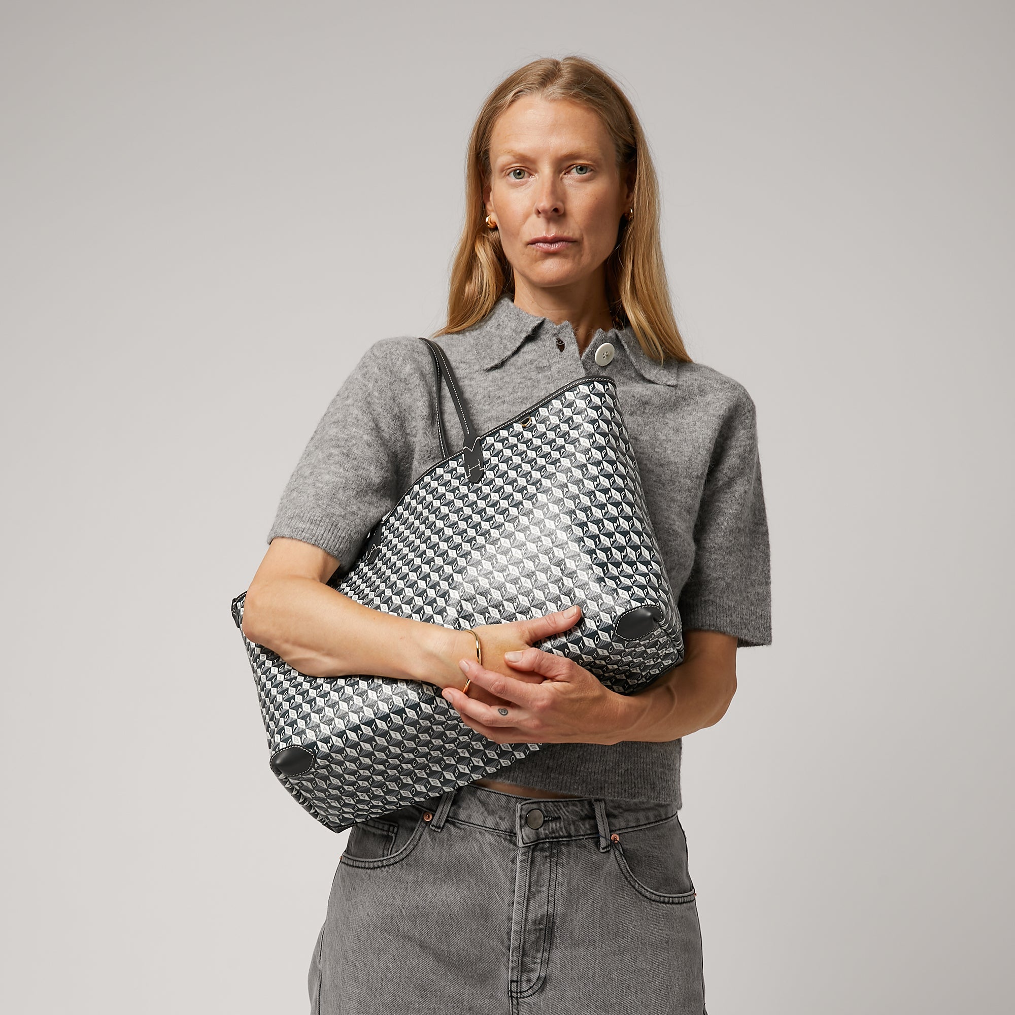 I Am A Plastic Bag Tote -

                  
                    Recycled Coated Canvas in Charcoal -
                  

                  Anya Hindmarch UK
