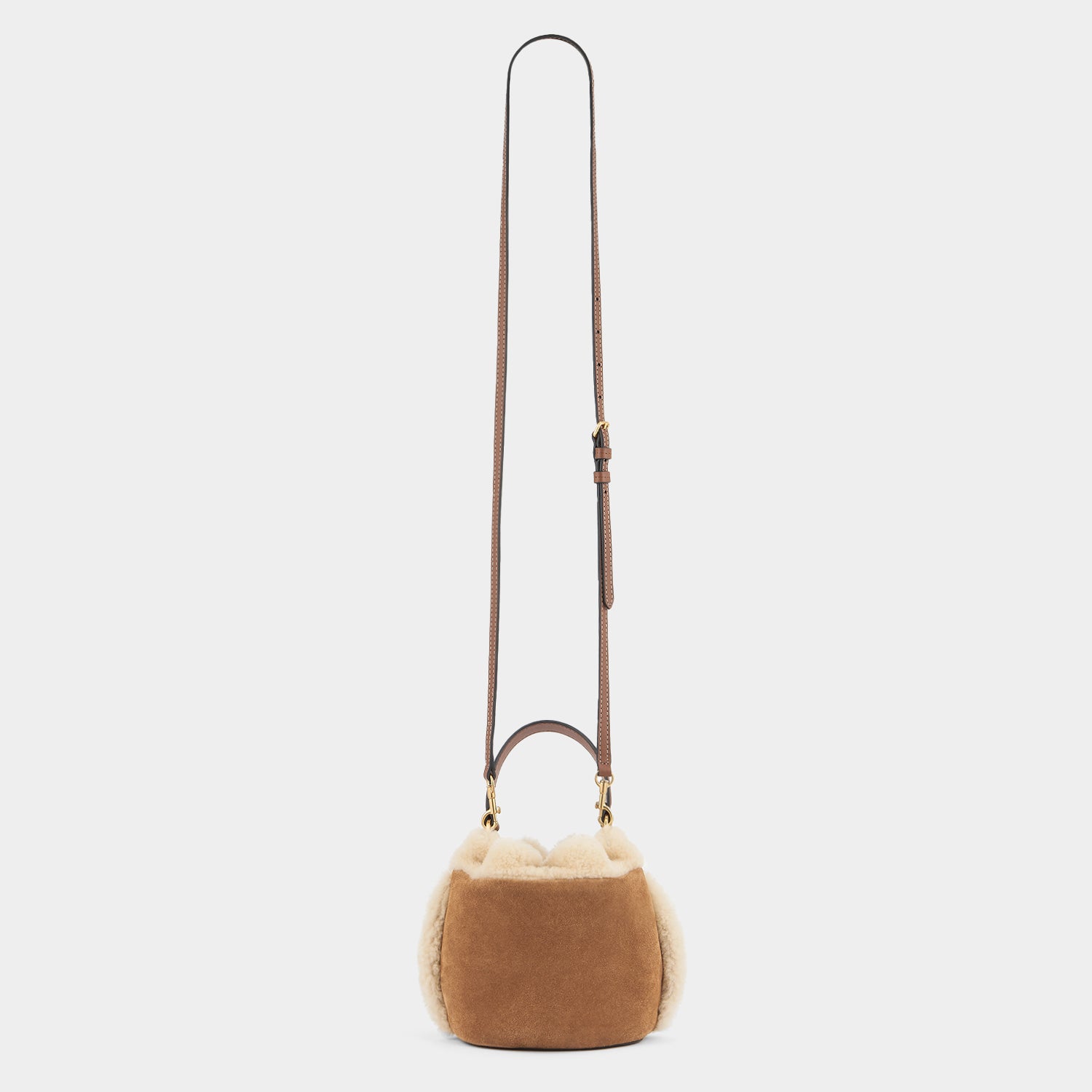 Eyes Drawstring Cross-body -

                  
                    Suede in Acorn -
                  

                  Anya Hindmarch UK
