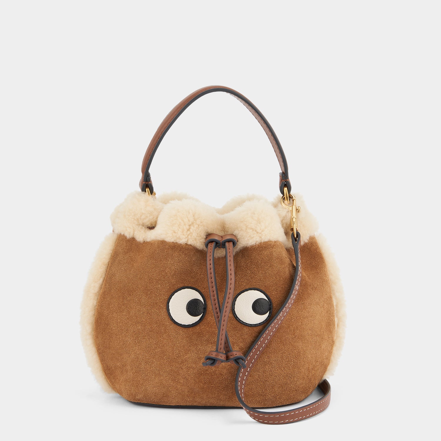 Eyes Drawstring Cross-body -

                  
                    Suede in Acorn -
                  

                  Anya Hindmarch UK
