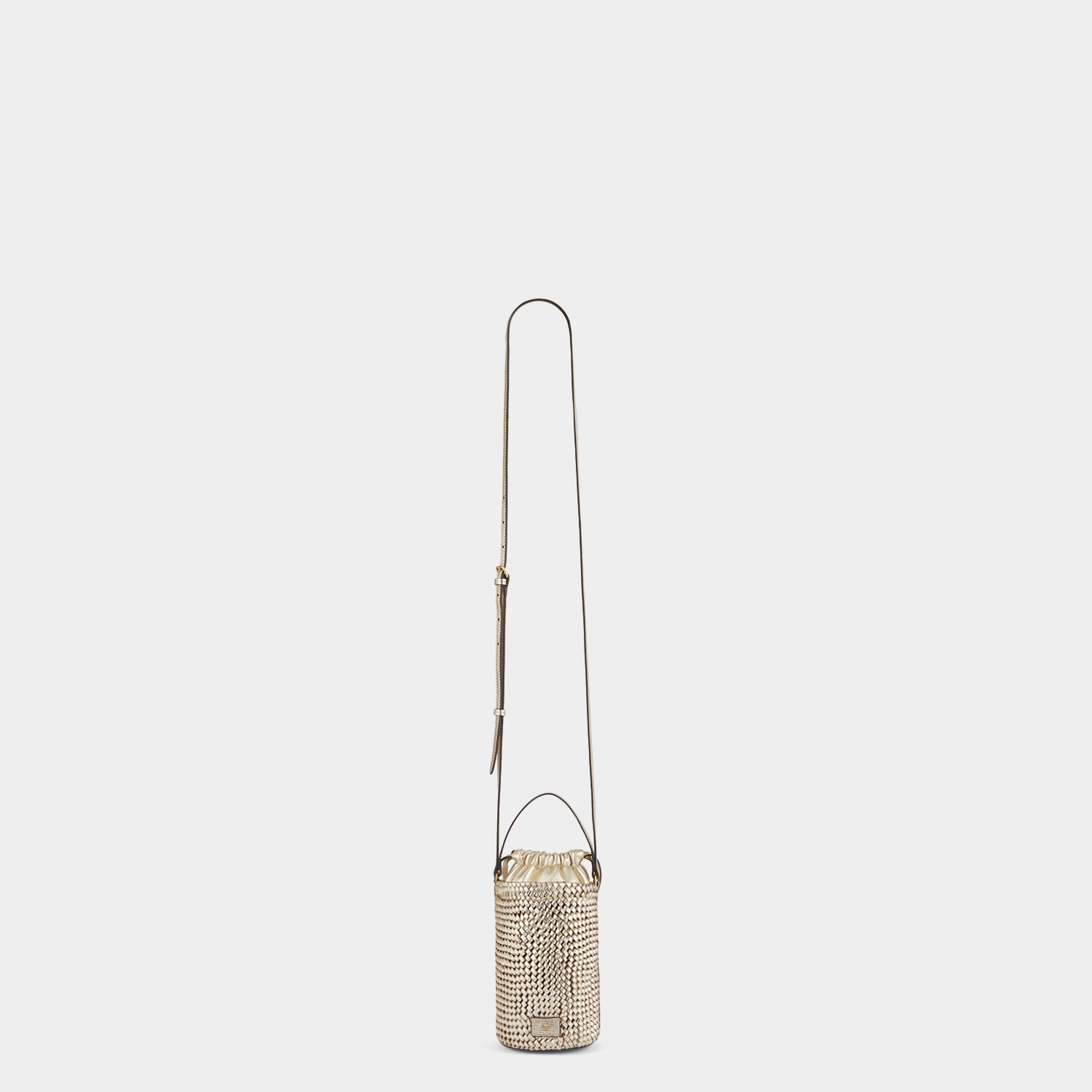 Plaited Mini Eyes Cross-body -

                  
                    Capra Leather in Light Gold -
                  

                  Anya Hindmarch UK
