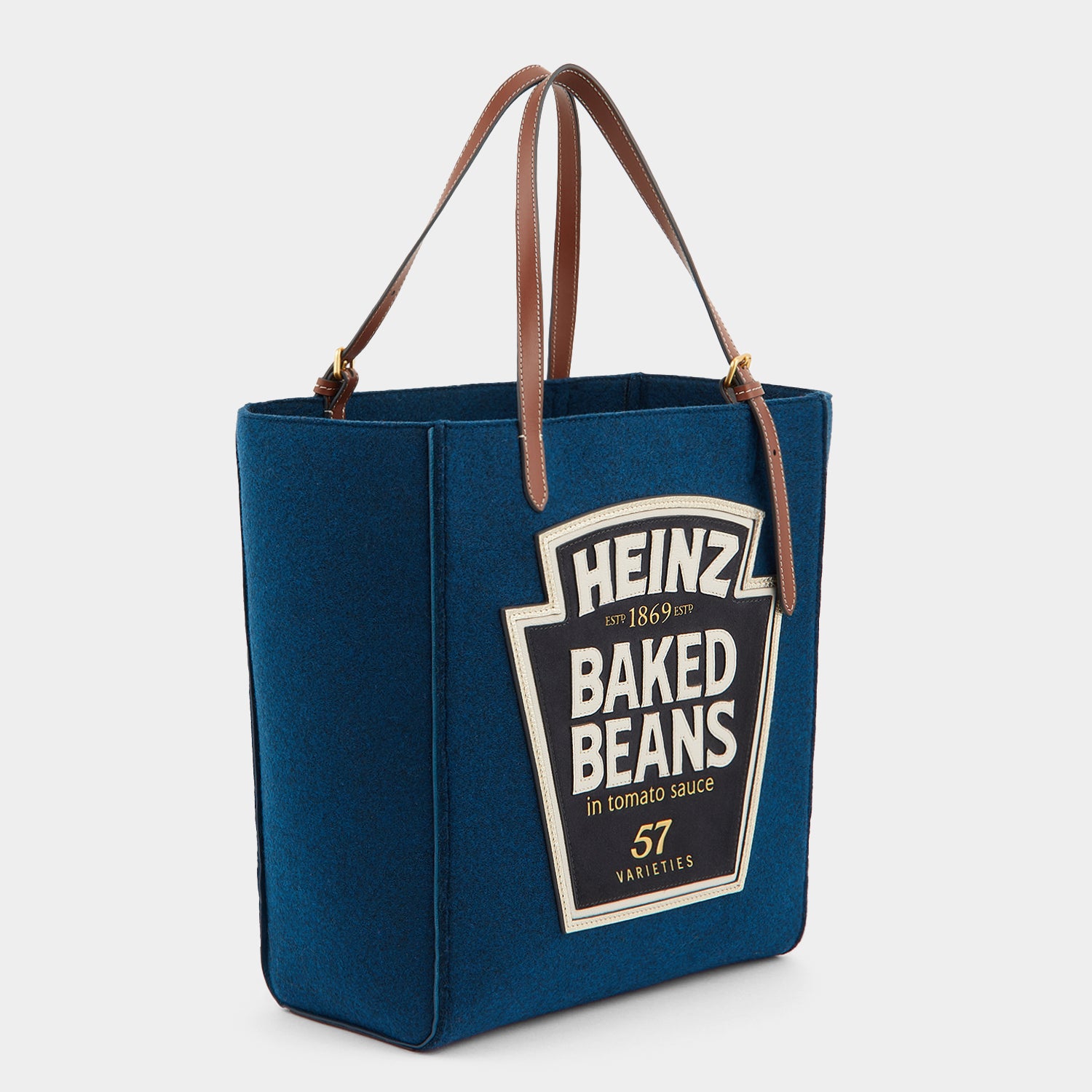 Anya Brands Baked Beans Small Tote -

                  
                    Recycled Felt in Teal -
                  

                  Anya Hindmarch UK
