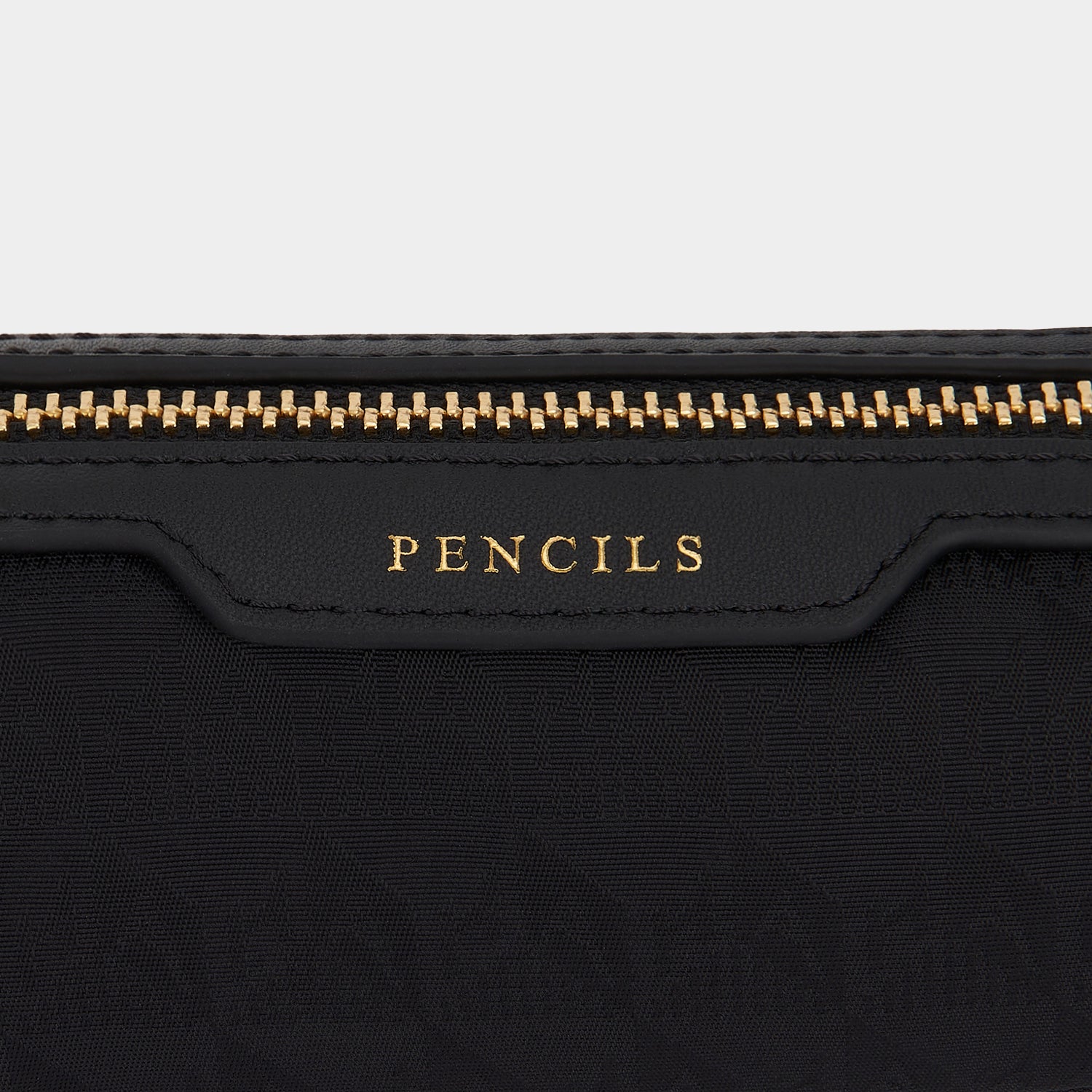 Logo Dog Pencil Case -

                  
                    Ah Logo Nylon in Black -
                  

                  Anya Hindmarch UK
