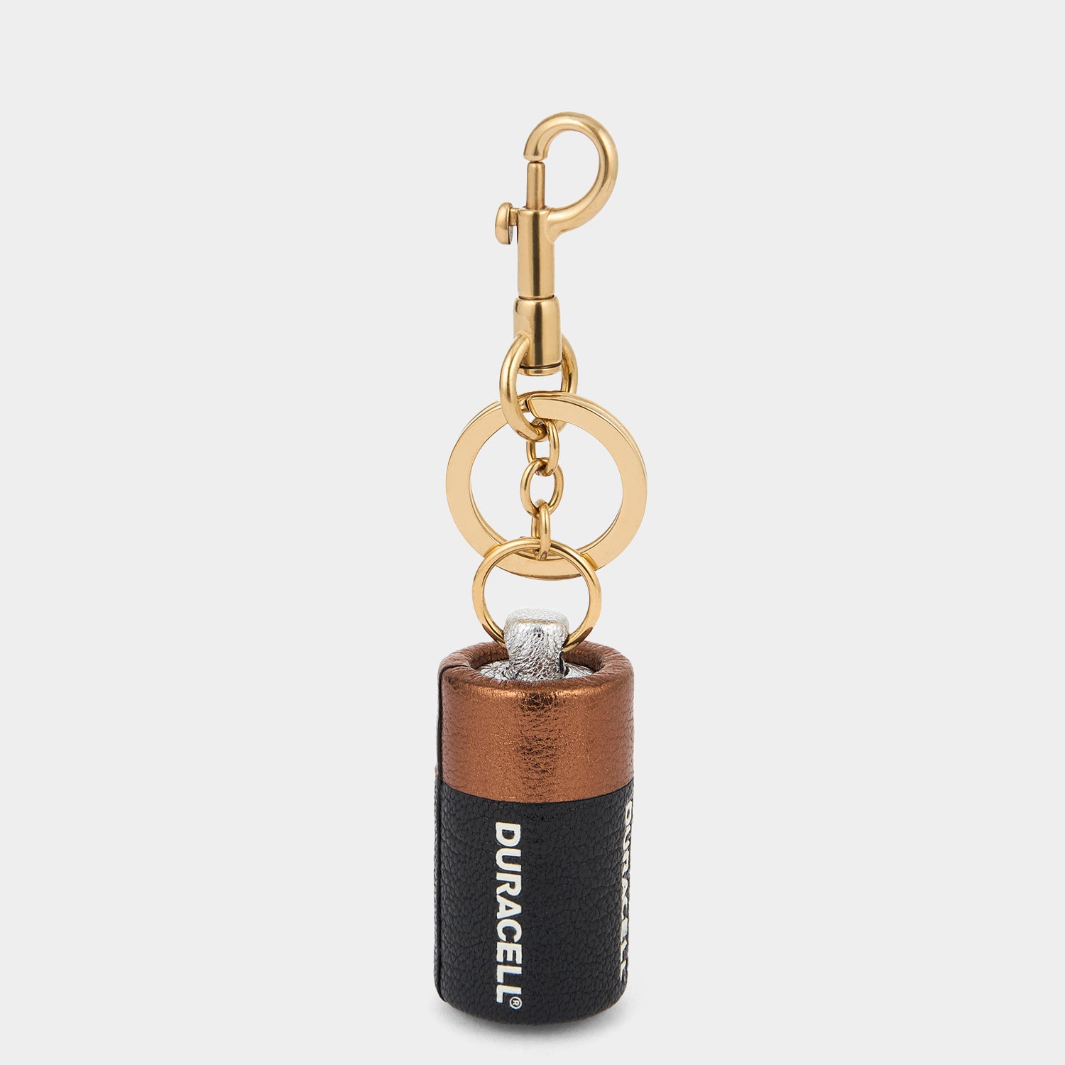Anya Brands Duracell Charm -

          
            Capra Leather in Black -
          

          Anya Hindmarch UK
