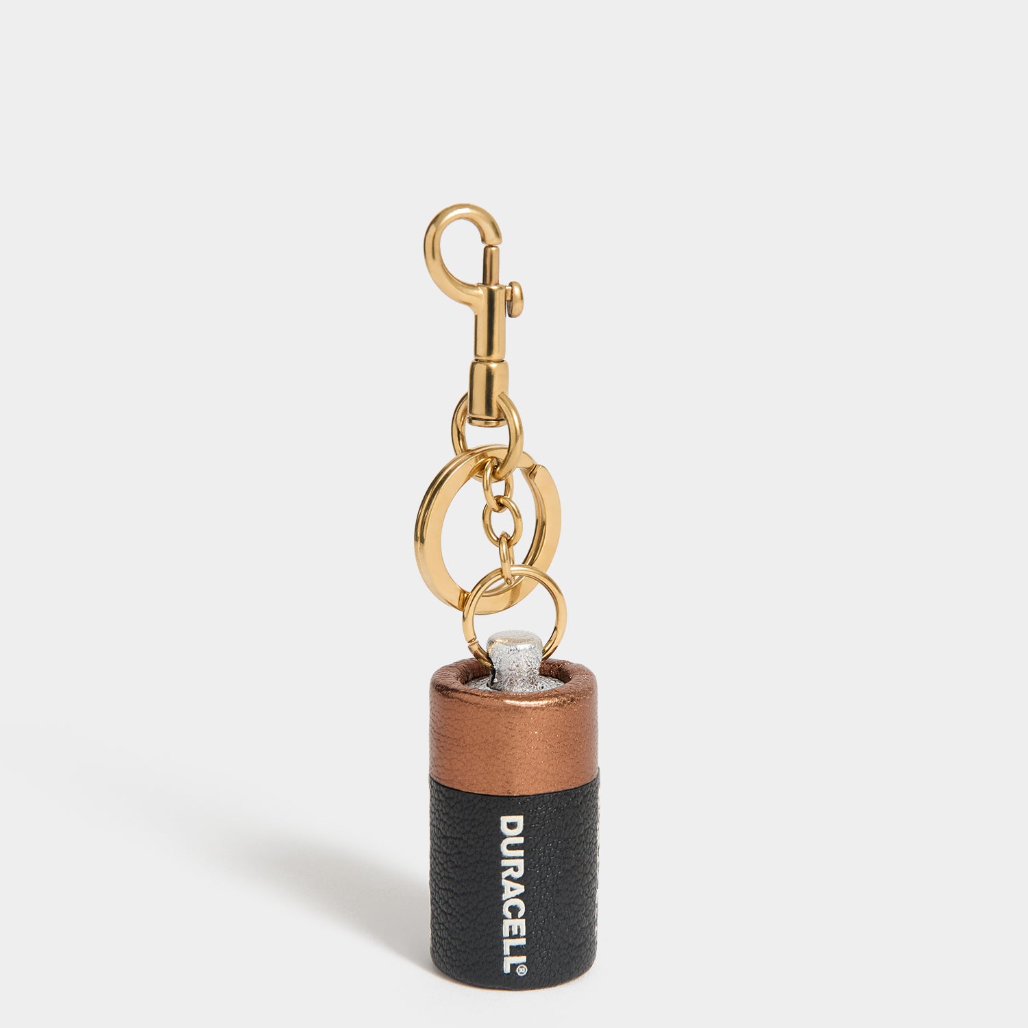 Anya Brands Duracell Charm -

          
            Capra Leather in Black -
          

          Anya Hindmarch UK

