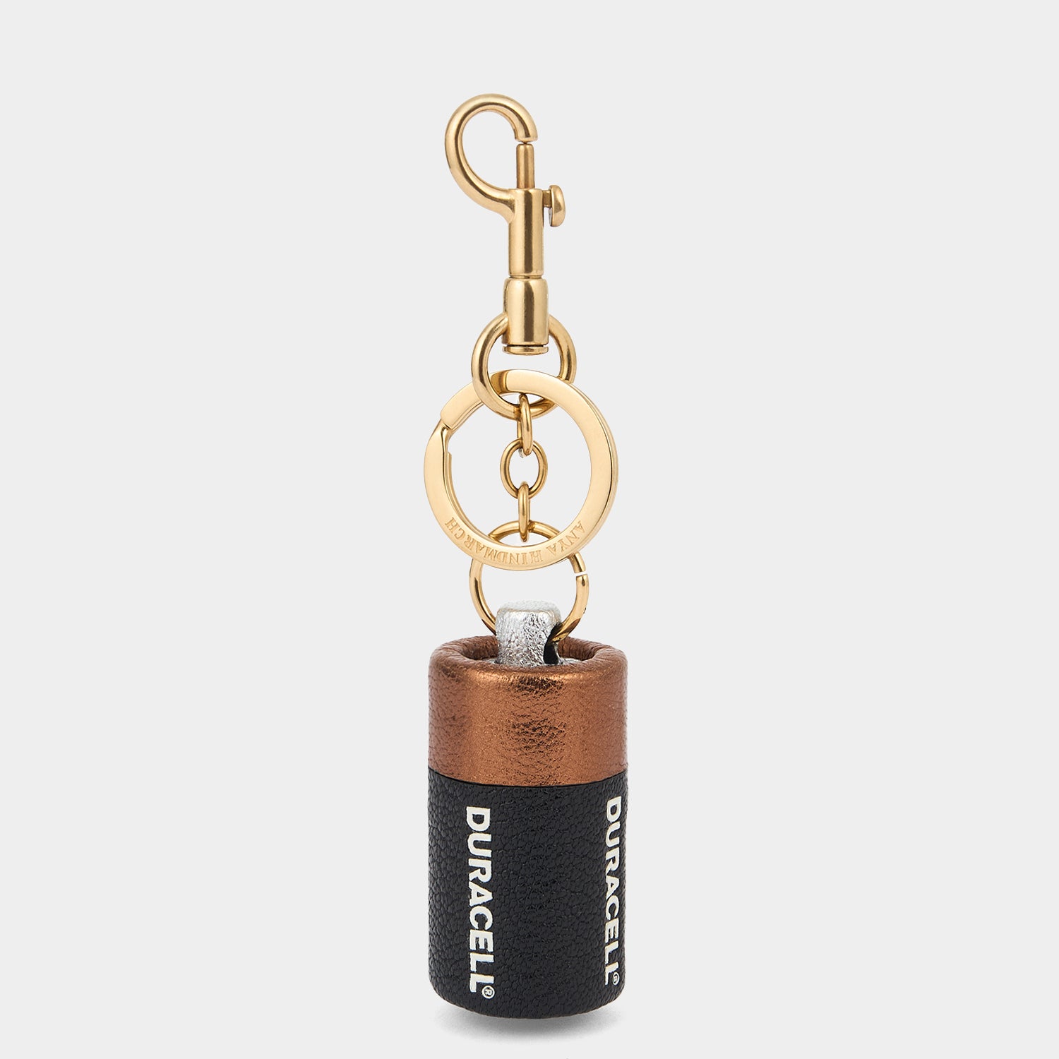 Anya Brands Duracell Charm -

          
            Capra Leather in Black -
          

          Anya Hindmarch UK

