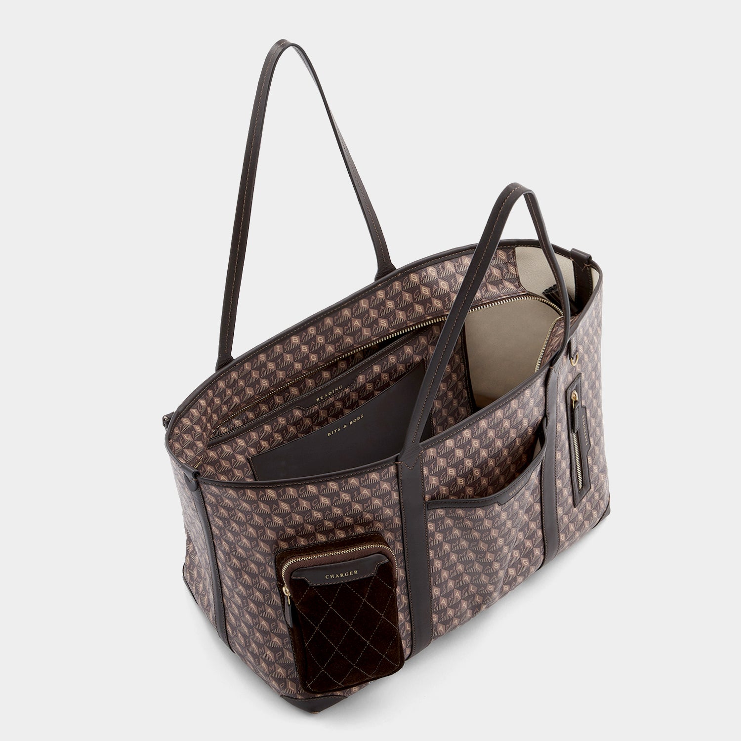 I Am A Plastic Bag In-Flight Tote -

          
            Recycled Canvas in Truffle -
          

          Anya Hindmarch UK
