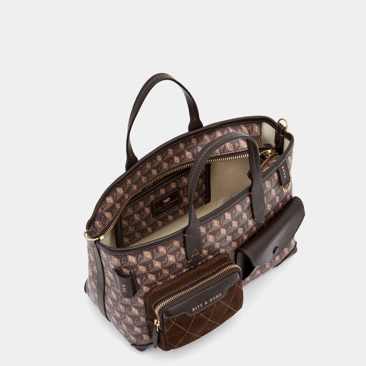 I Am A Plastic Bag XS Multi Pocket Tote -

                  
                    Recycled Canvas in Truffle -
                  

                  Anya Hindmarch UK
