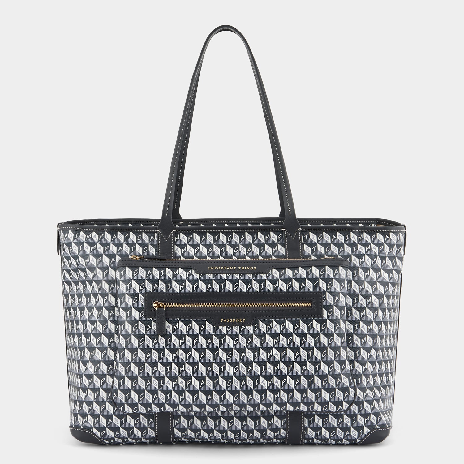 I am a Plastic Bag In-Flight Tote -

                  
                    Recycled coated canvas in charcoal -
                  

                  Anya Hindmarch UK
