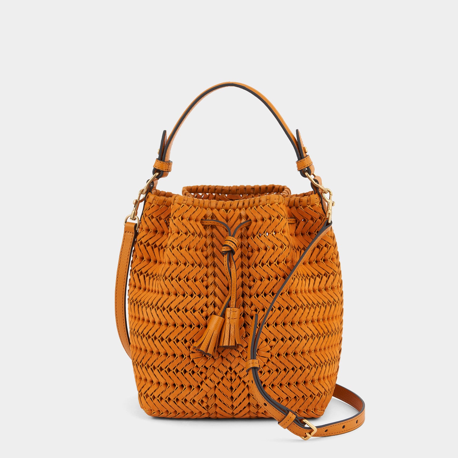 Neeson Small Drawstring -

                  
                    Nubuck Leather in Sunset -
                  

                  Anya Hindmarch UK
