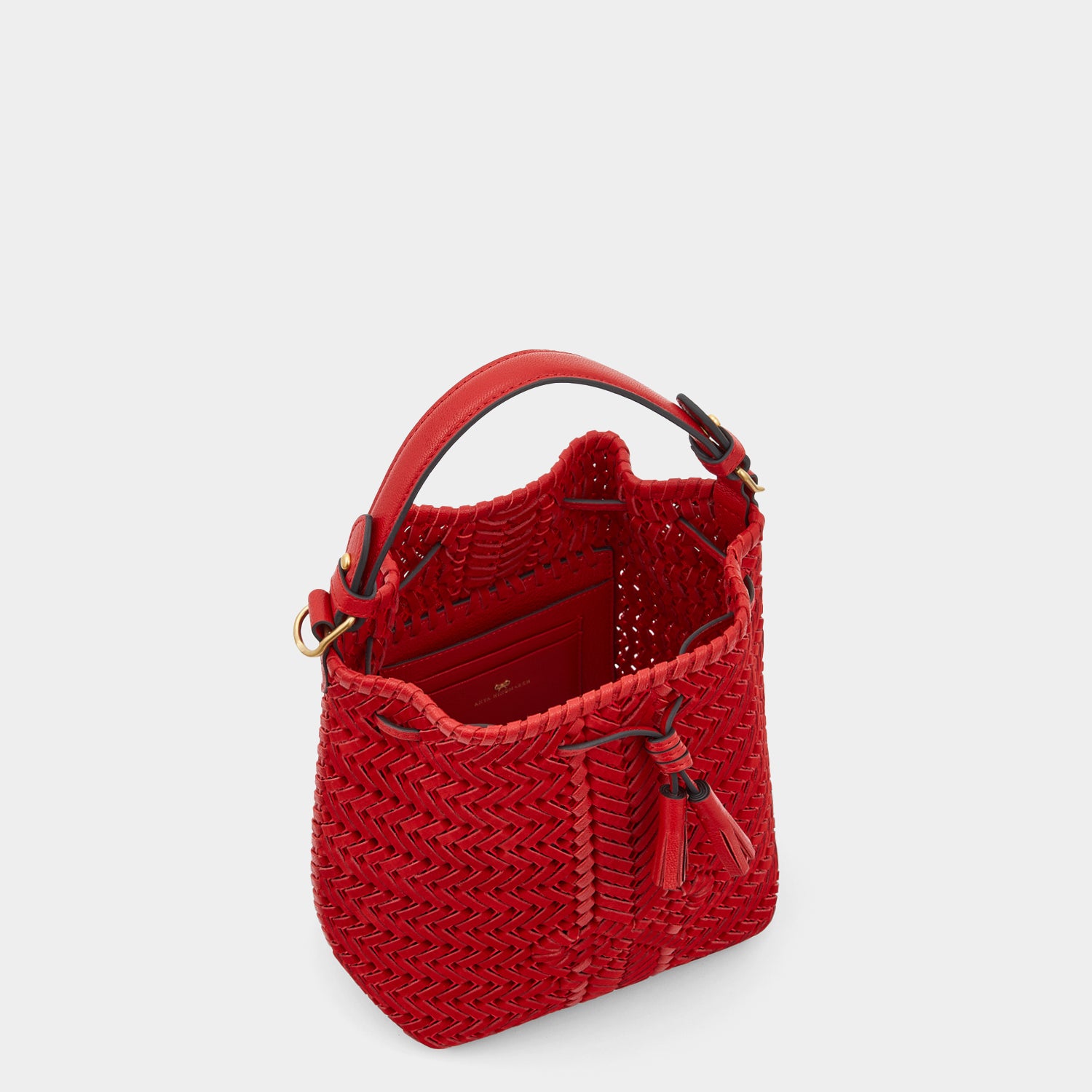 Neeson Small Drawstring -

                  
                    Nubuck Leather in Red -
                  

                  Anya Hindmarch UK
