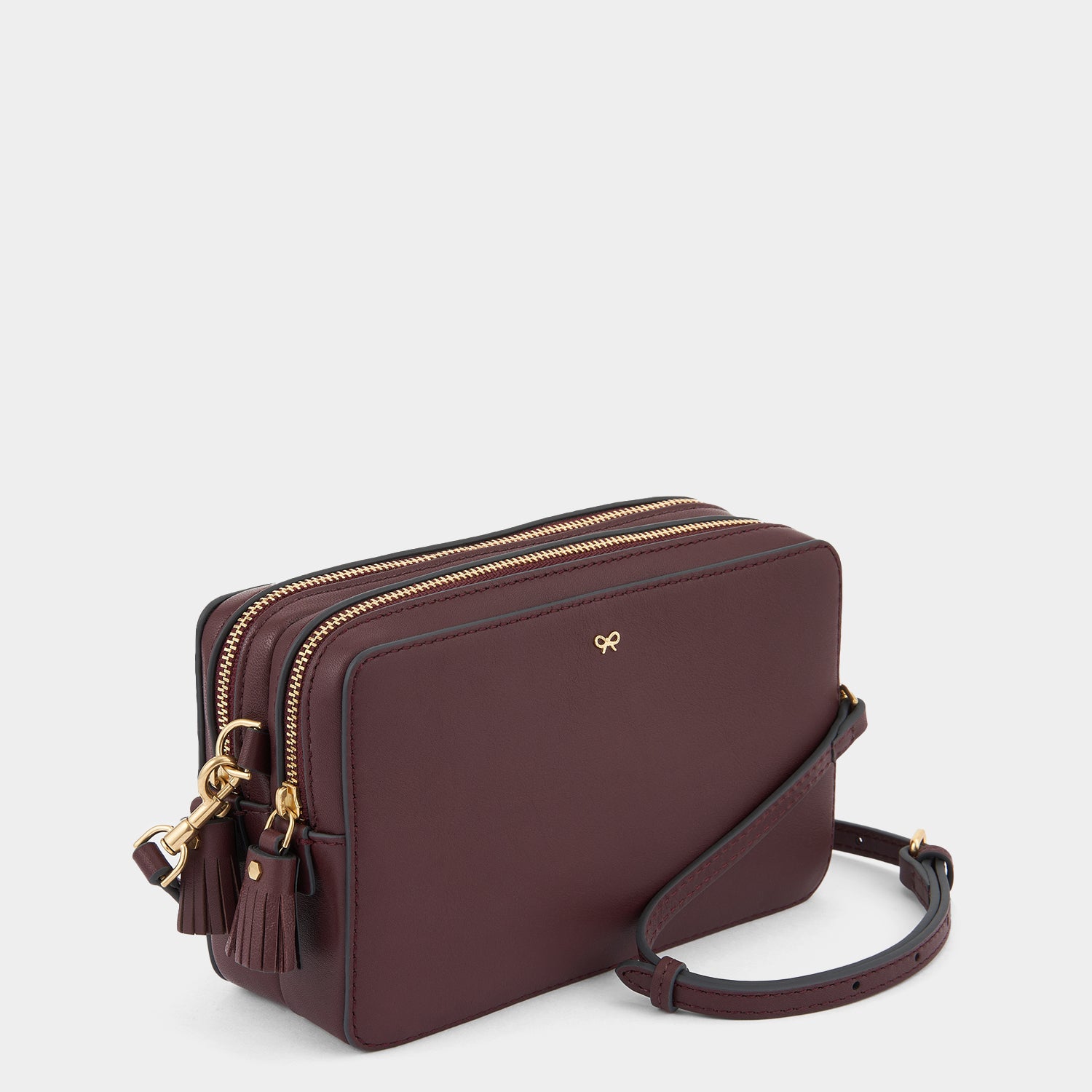 Quilted Double Zip Cross-body -

                  
                    Calf Leather in Claret -
                  

                  Anya Hindmarch UK
