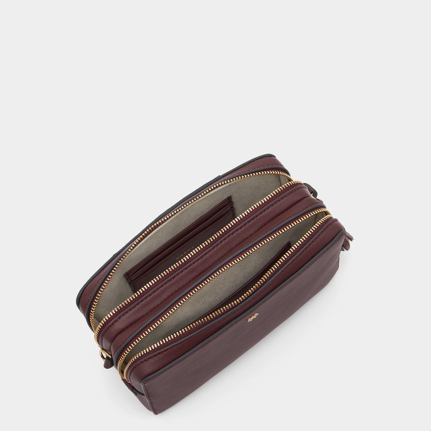 Quilted Double Zip Cross-body -

                  
                    Calf Leather in Claret -
                  

                  Anya Hindmarch UK
