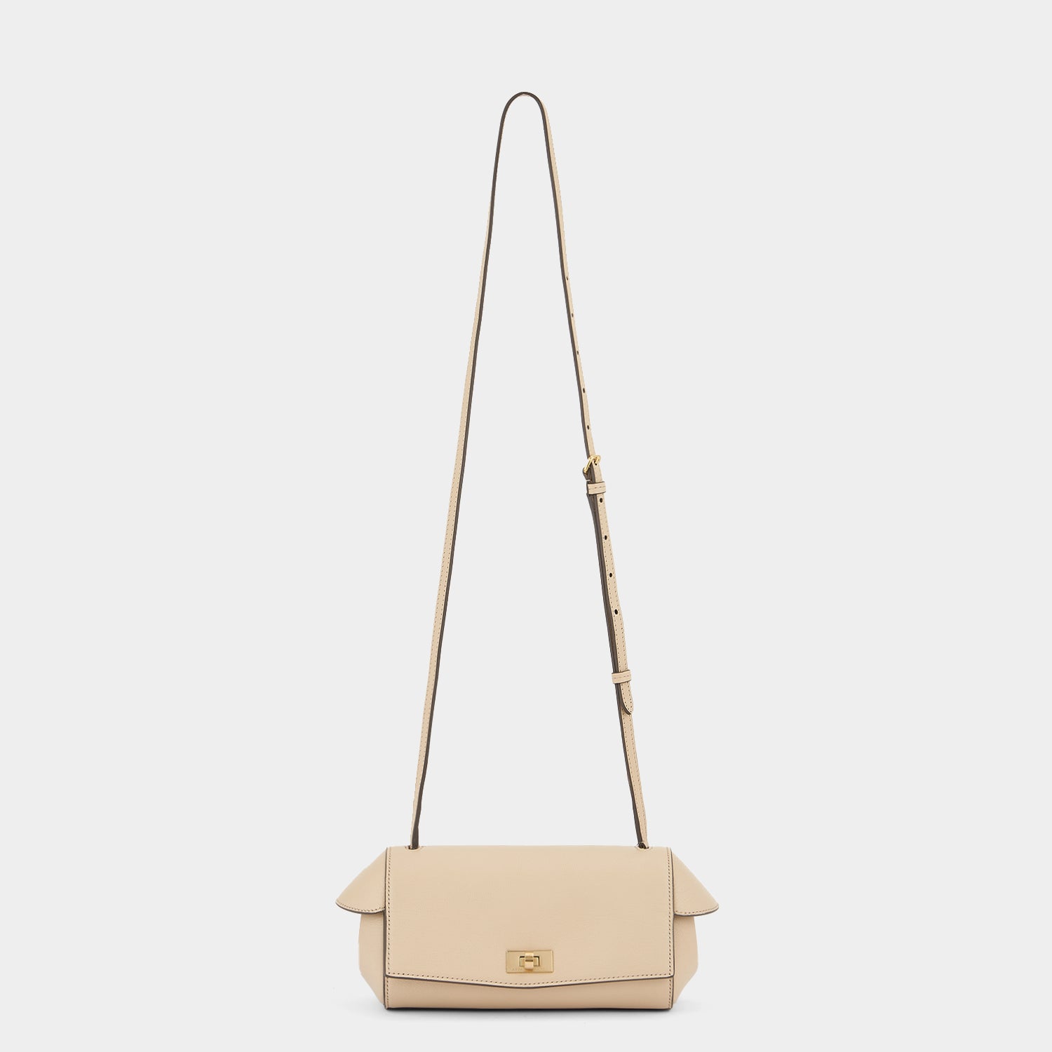 Tube Shoulder Bag -

                  
                    Capra Leather in Buff -
                  

                  Anya Hindmarch UK
