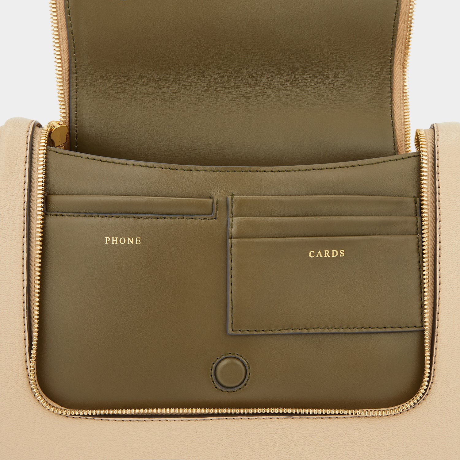 Vere Soft Satchel Cross-body -

                  
                    Grain Leather in Buff -
                  

                  Anya Hindmarch UK
