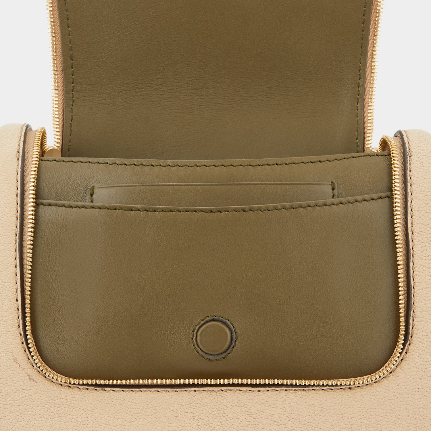 Vere Small Soft Satchel Cross-body -

                  
                    Grain Leather in Buff -
                  

                  Anya Hindmarch UK
