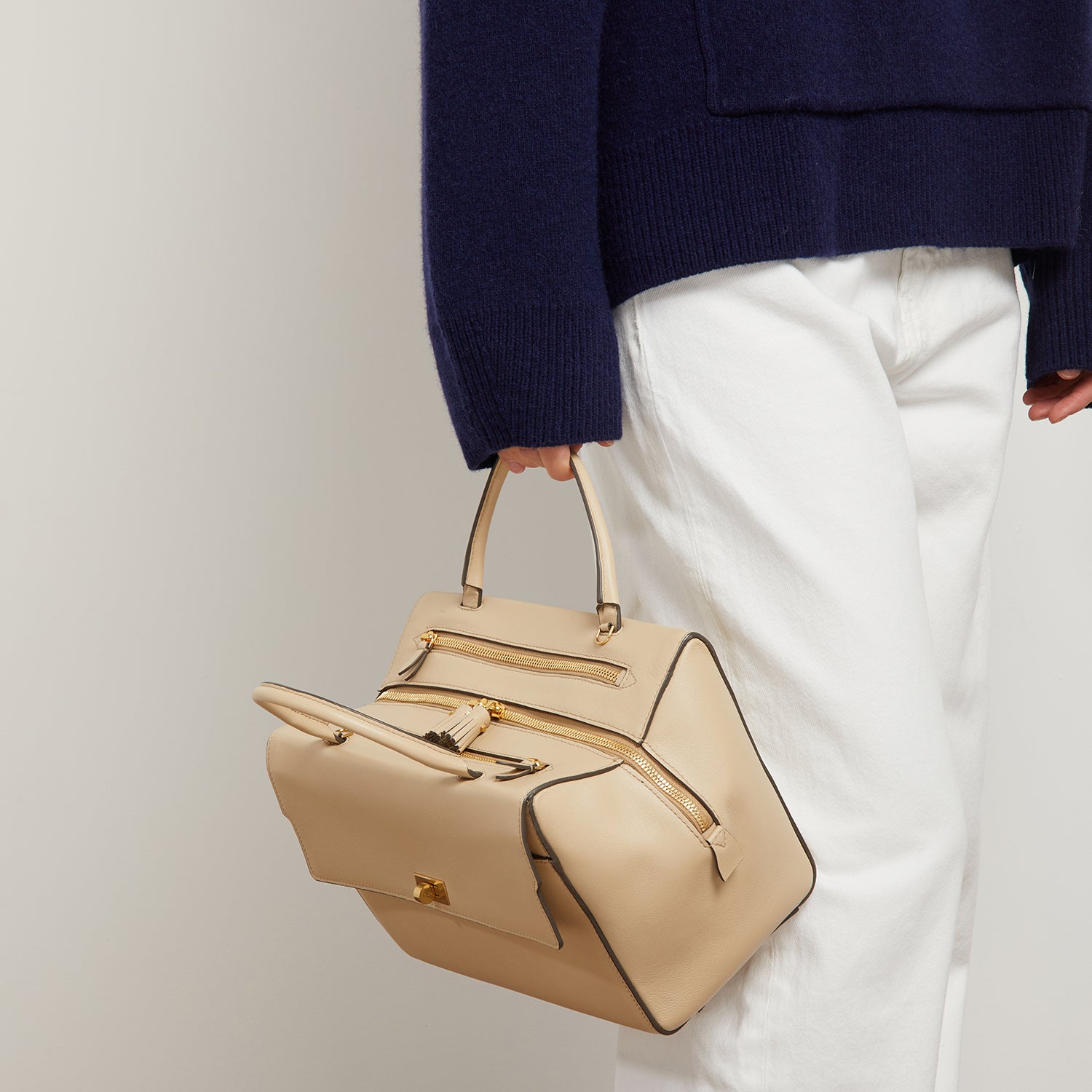 Small Seaton -

                  
                    Calf Leather in Buff -
                  

                  Anya Hindmarch UK
