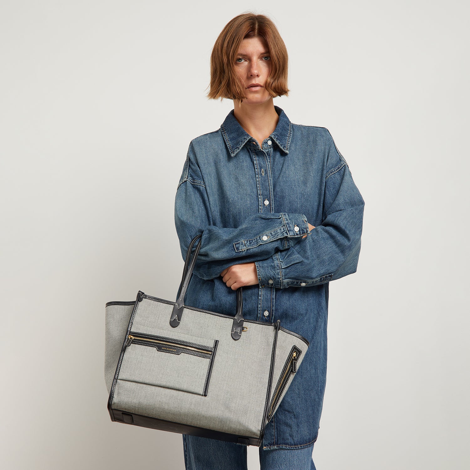 Pocket Tote -

                  
                    Mixed Canvas in Salt and Pepper -
                  

                  Anya Hindmarch UK
