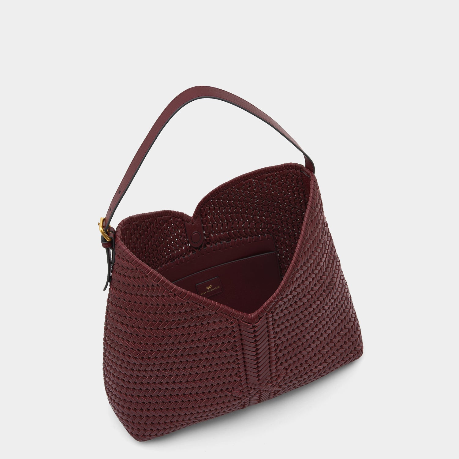 Neeson Tassel Hobo -

                  
                    Capra Leather in Rosewood -
                  

                  Anya Hindmarch UK
