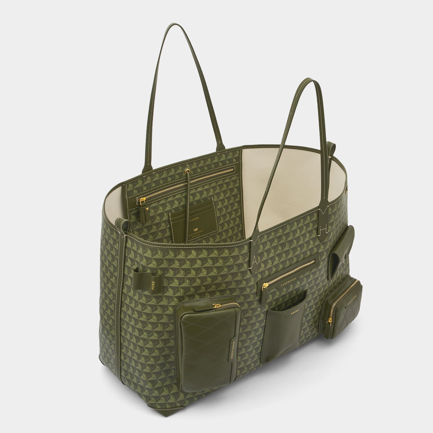 I Am A Plastic Bag XL Multi Pocket Tote -

                  
                    Recycled Canvas in Fern -
                  

                  Anya Hindmarch UK
