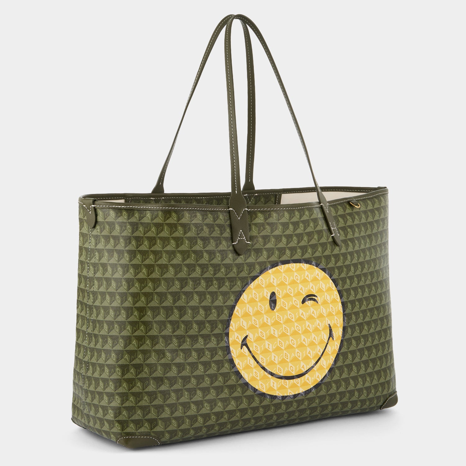 I Am A Plastic Bag Wink Tote -

                  
                    Recycled Canvas in Fern -
                  

                  Anya Hindmarch UK
