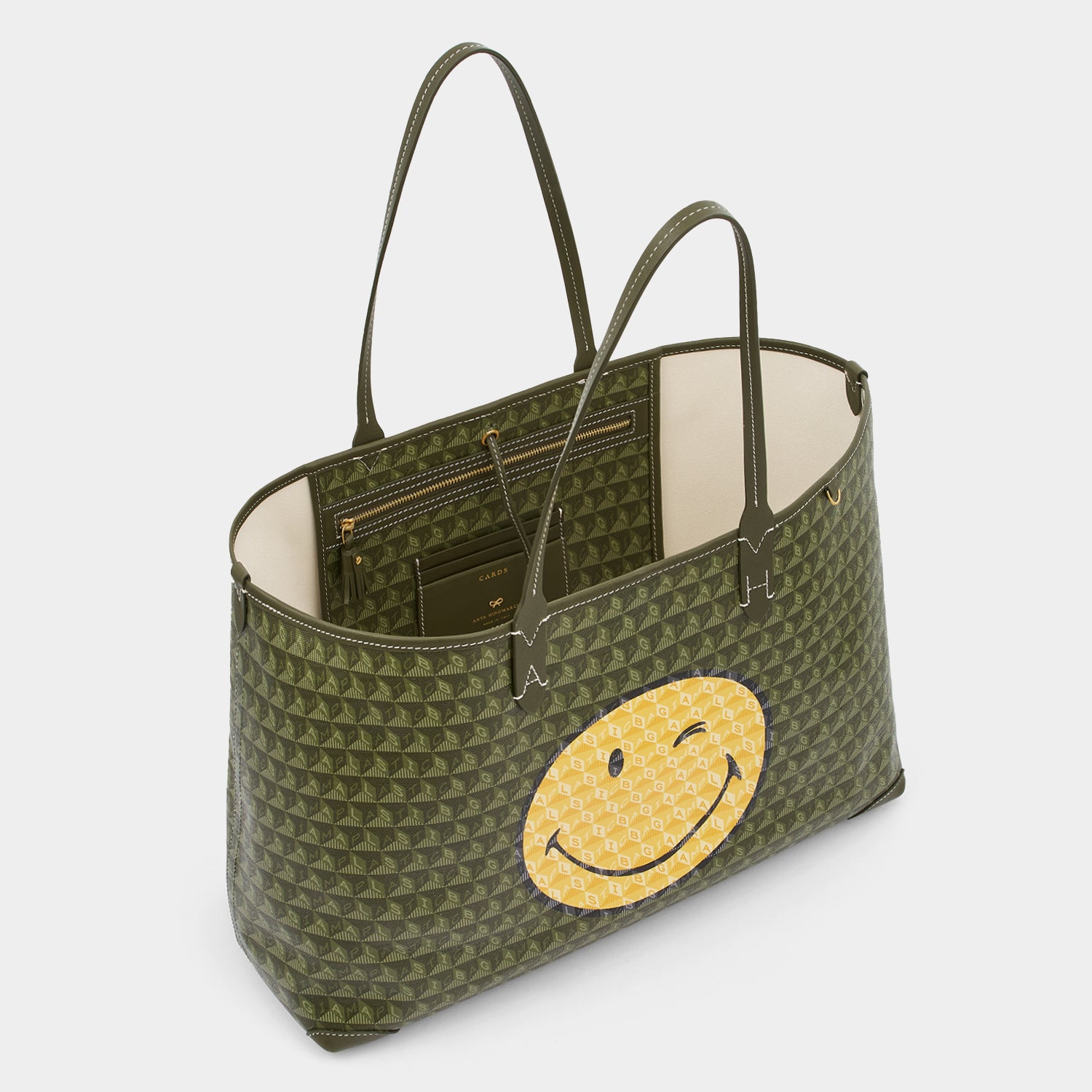 I Am A Plastic Bag Wink Tote -

                  
                    Recycled Canvas in Fern -
                  

                  Anya Hindmarch UK
