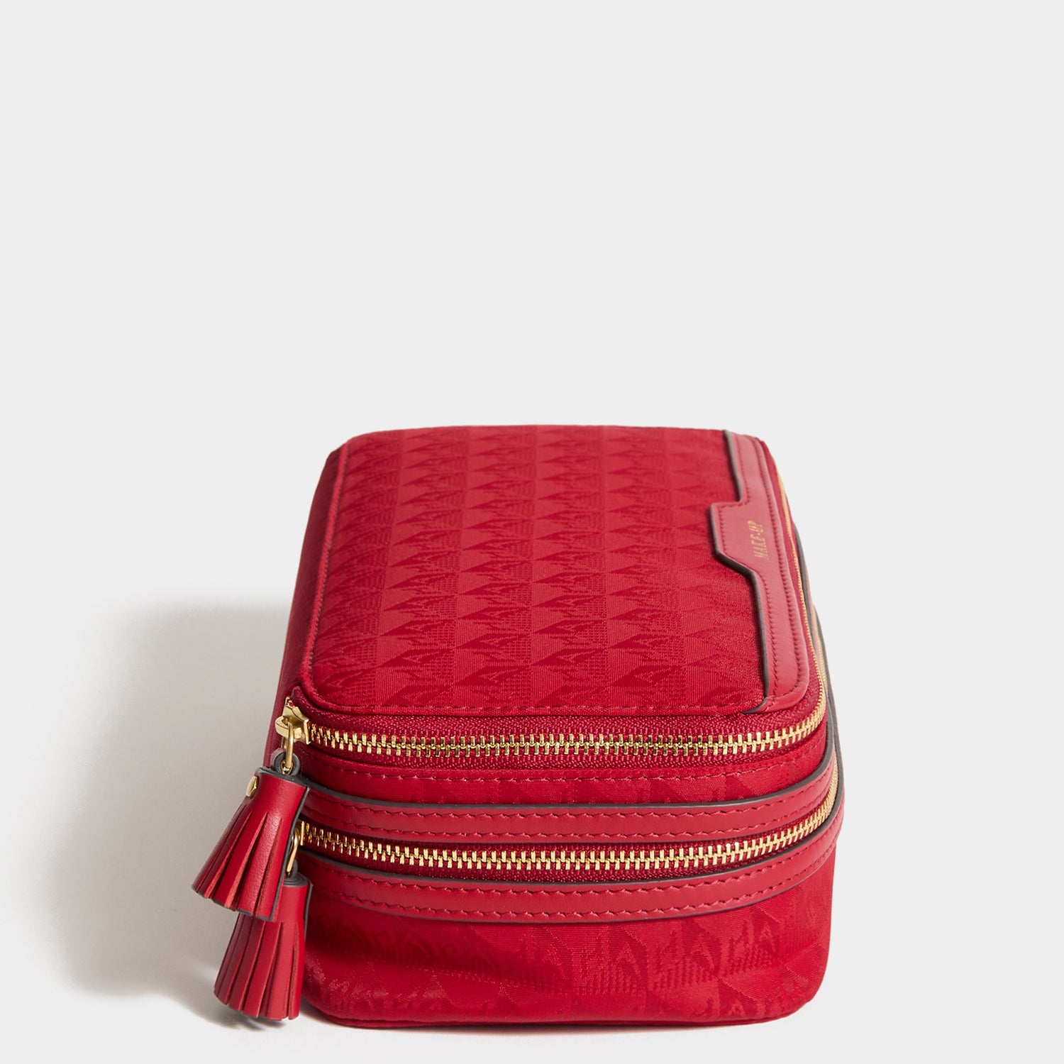 Logo Make-Up Pouch -

          
            Jacquard Nylon Up in Red -
          

          Anya Hindmarch UK
