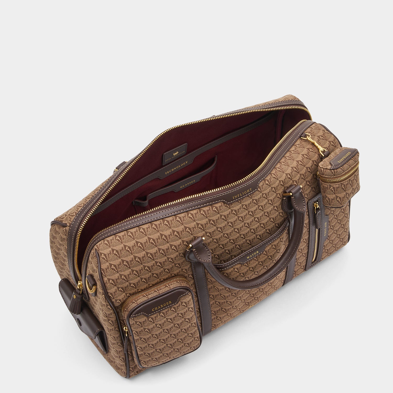 Jacquard In-Flight Barrel Travel Bag -

                  
                    Jacquard in Dark Earth -
                  

                  Anya Hindmarch UK
