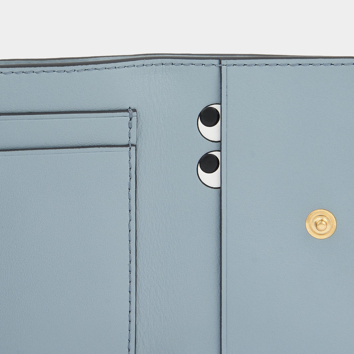 Peeping Eyes Mini Trifold Zip Wallet -

                  
                    Capra Leather in Rosewood -
                  

                  Anya Hindmarch UK
