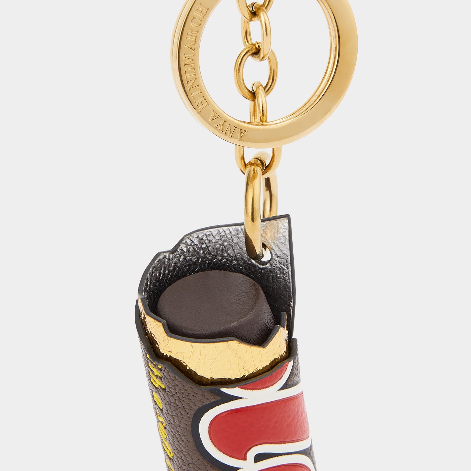 Anya Brands Rolo Charm -

                  
                    Capra Leather in Truffle -
                  

                  Anya Hindmarch UK
