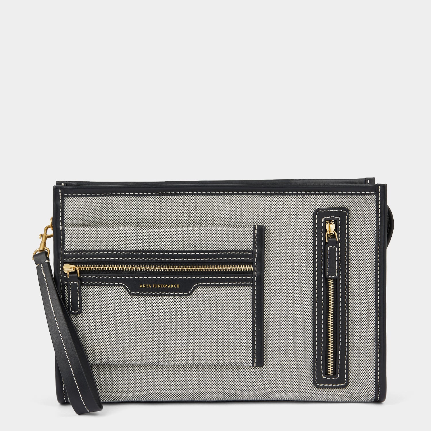 Pocket Pochette -

                  
                    Mixed Canvas in Salt And Pepper -
                  

                  Anya Hindmarch UK
