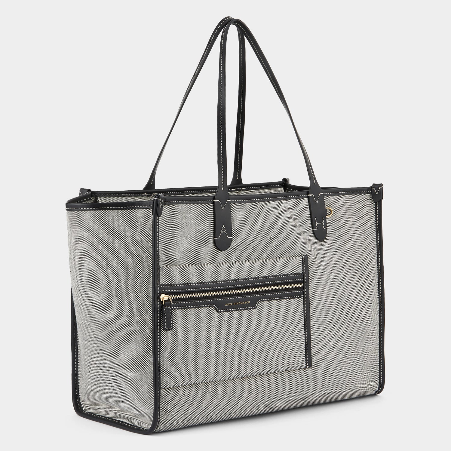 Pocket Tote -

                  
                    Mixed Canvas in Salt and Pepper -
                  

                  Anya Hindmarch UK
