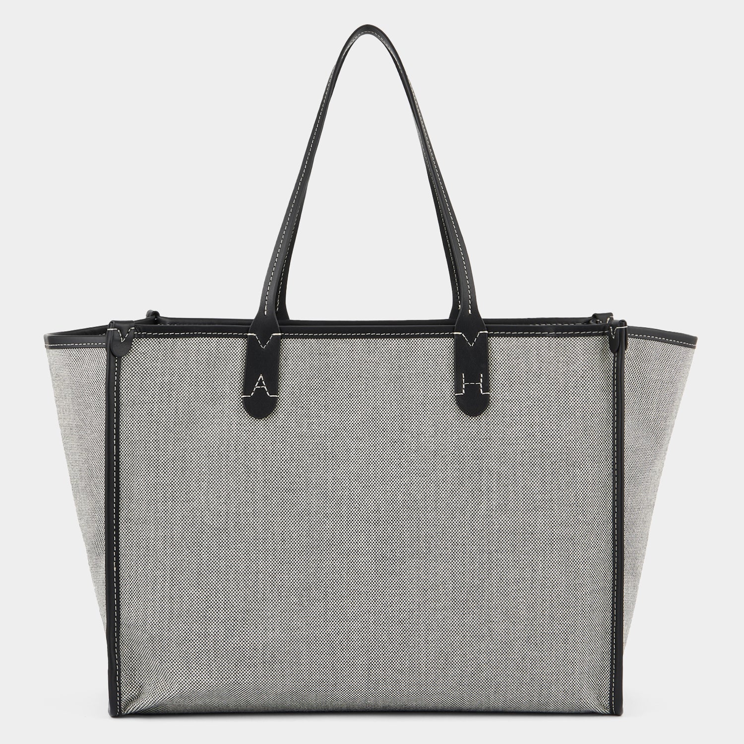 Pocket Tote -

                  
                    Mixed Canvas in Salt And Pepper -
                  

                  Anya Hindmarch UK
