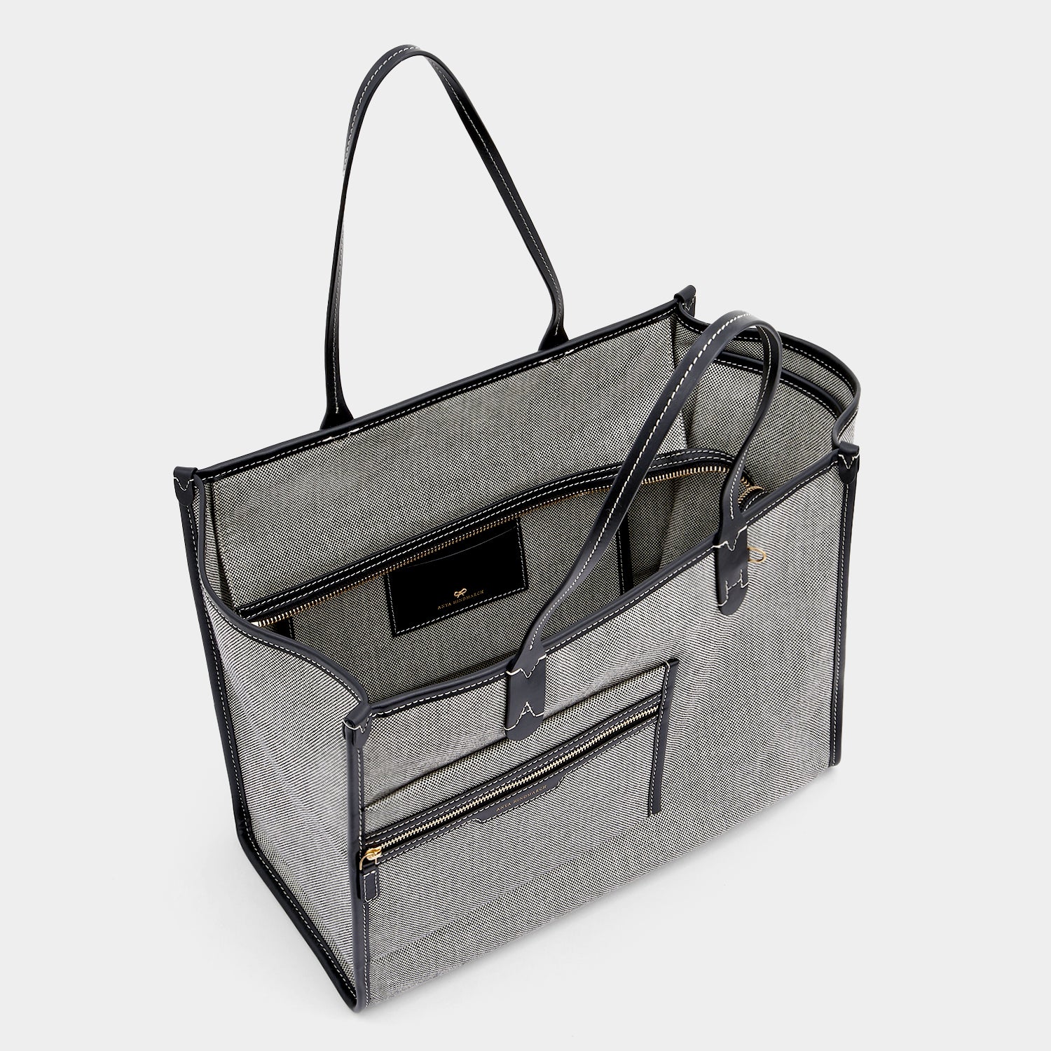 Pocket Tote -

          
            Mixed Canvas in Salt And Pepper -
          

          Anya Hindmarch UK
