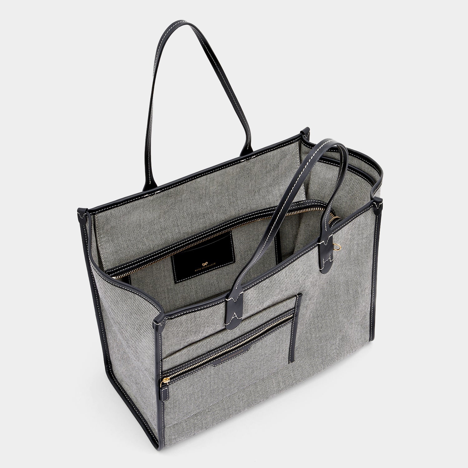 Pocket Tote -

                  
                    Mixed Canvas in Salt And Pepper -
                  

                  Anya Hindmarch UK
