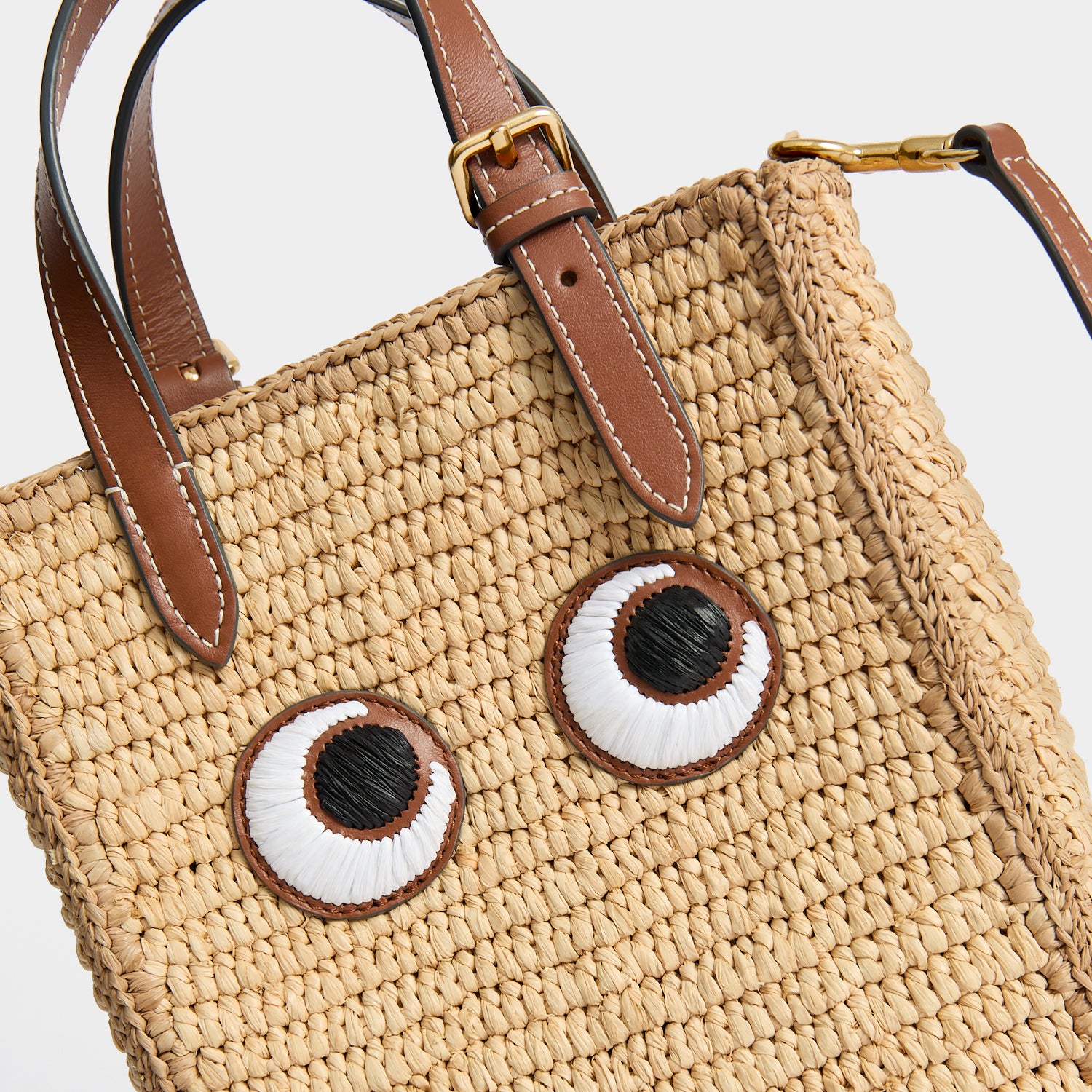 Mini Raffia Cross-body Tote Bag with Eyes | Anya Hindmarch UK