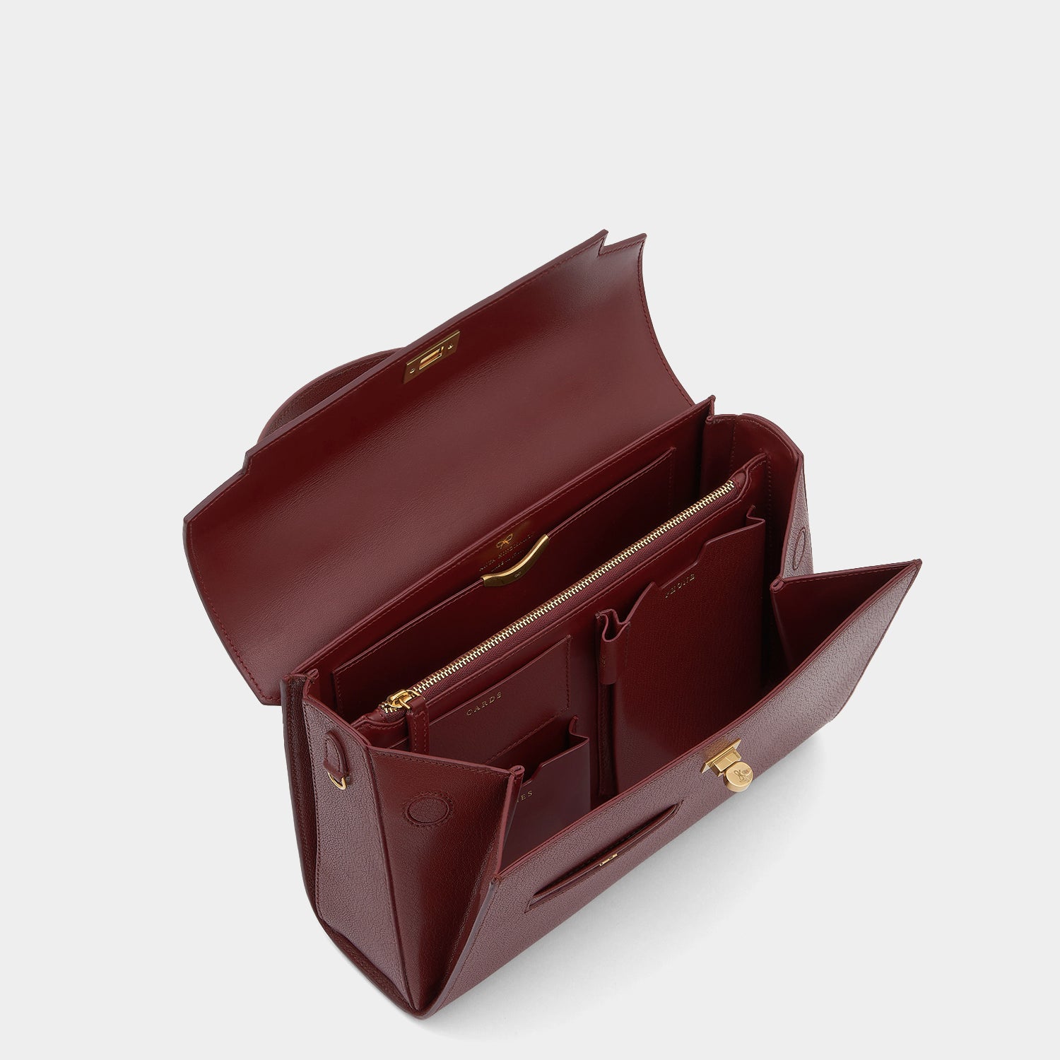 Mortimer Top Handle -

                  
                    Leather in Rosewood -
                  

                  Anya Hindmarch UK
