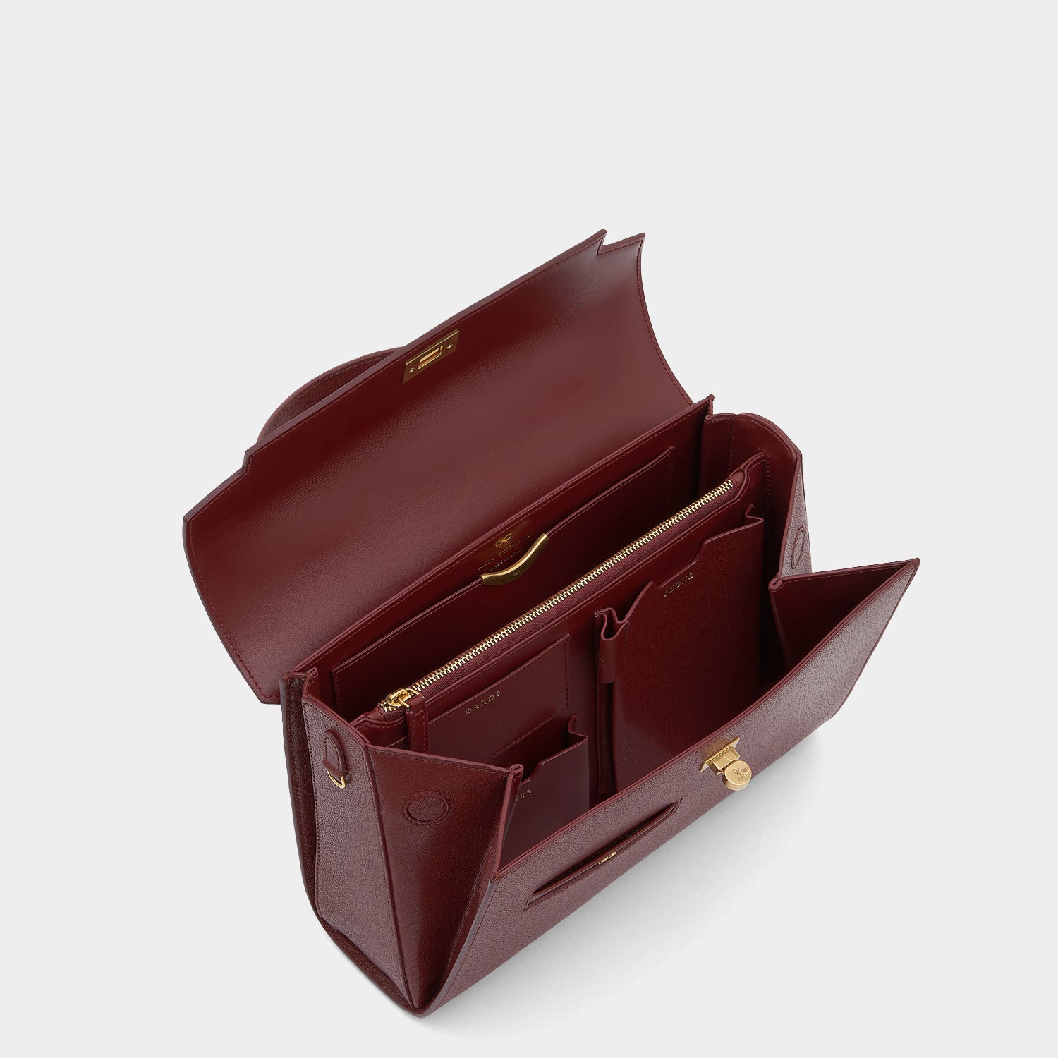Mortimer -

                  
                    Leather in Rosewood -
                  

                  Anya Hindmarch UK
