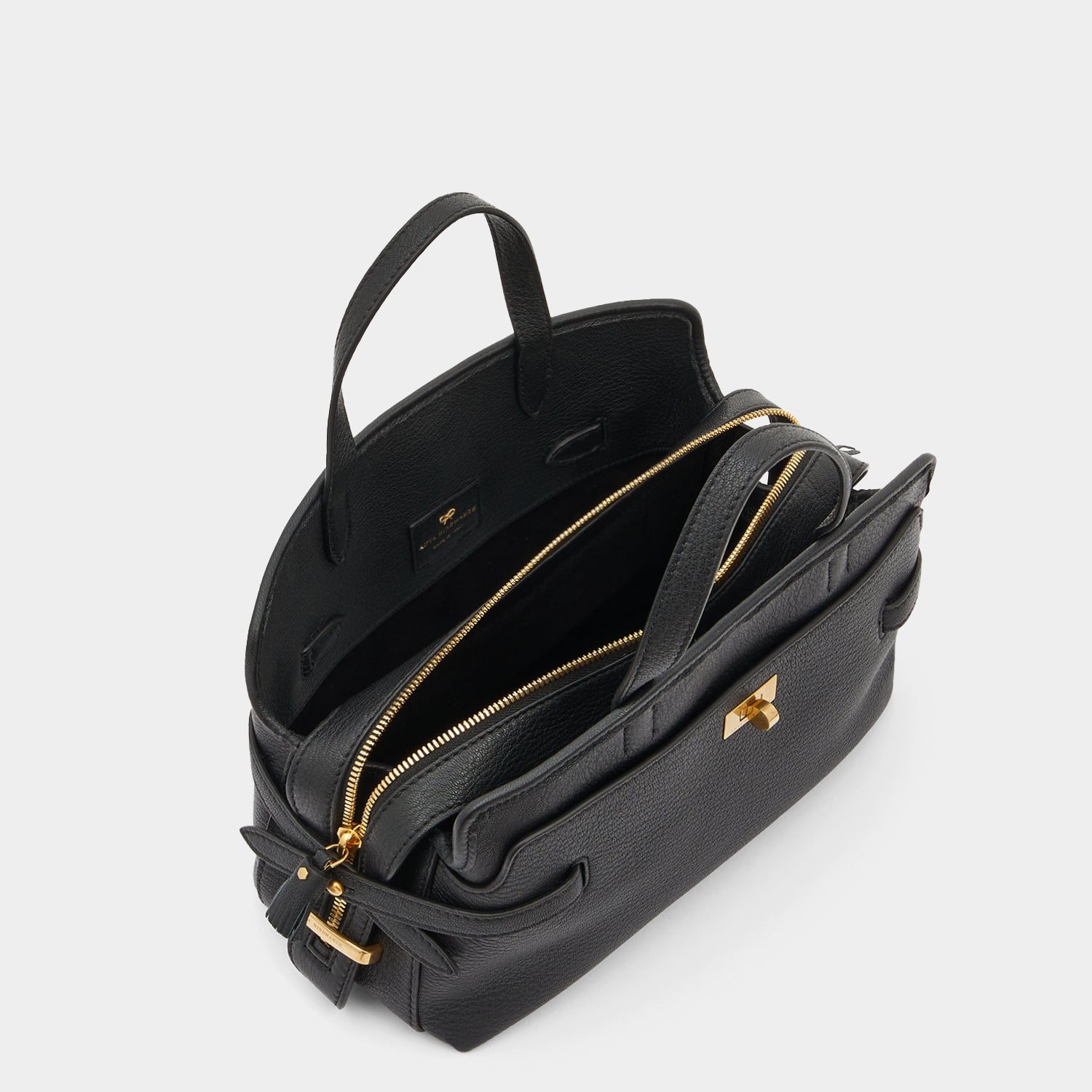 Wilson Cross-body -

                  
                    Grain Leather in Black -
                  

                  Anya Hindmarch UK
