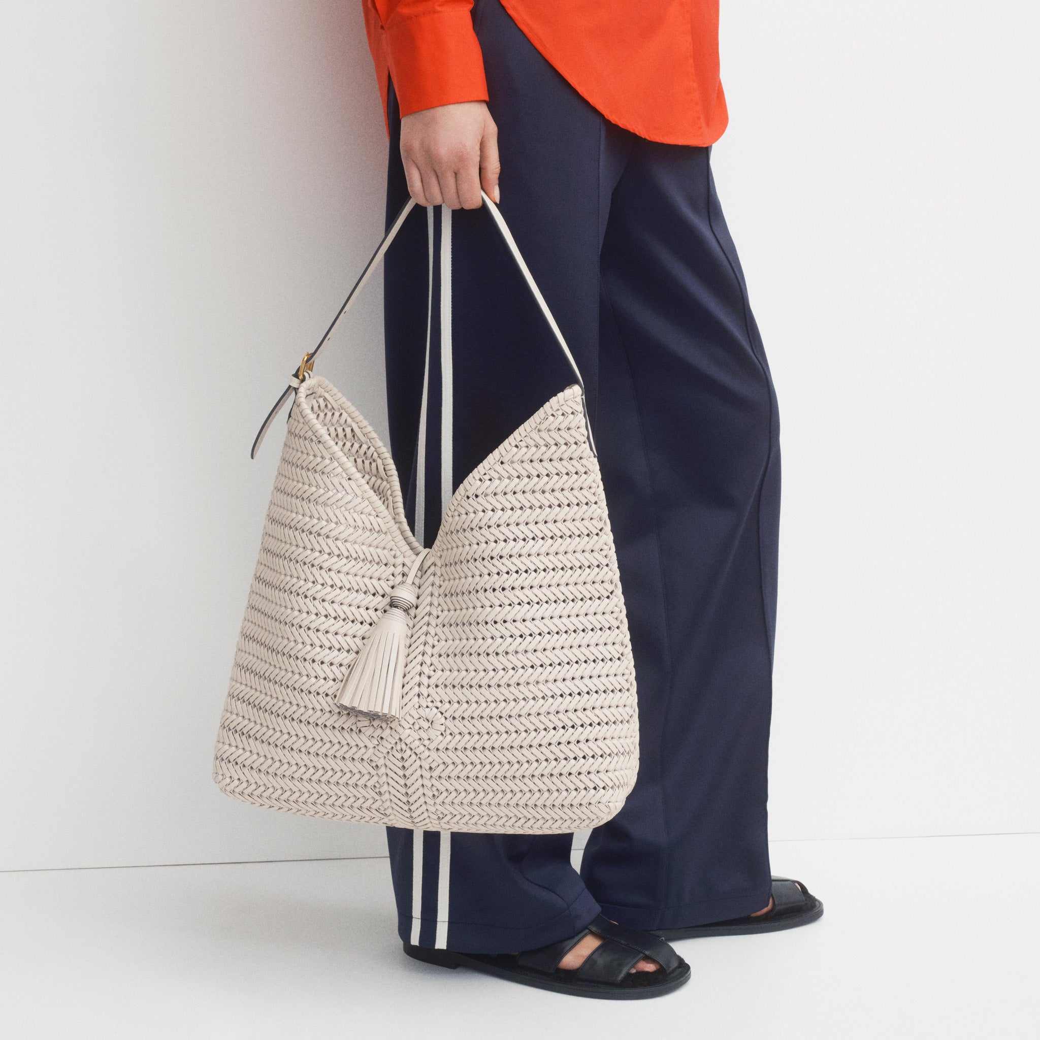 Neeson Tassel Hobo Bag -

          
            Capra Leather in Chalk -
          

          Anya Hindmarch UK
