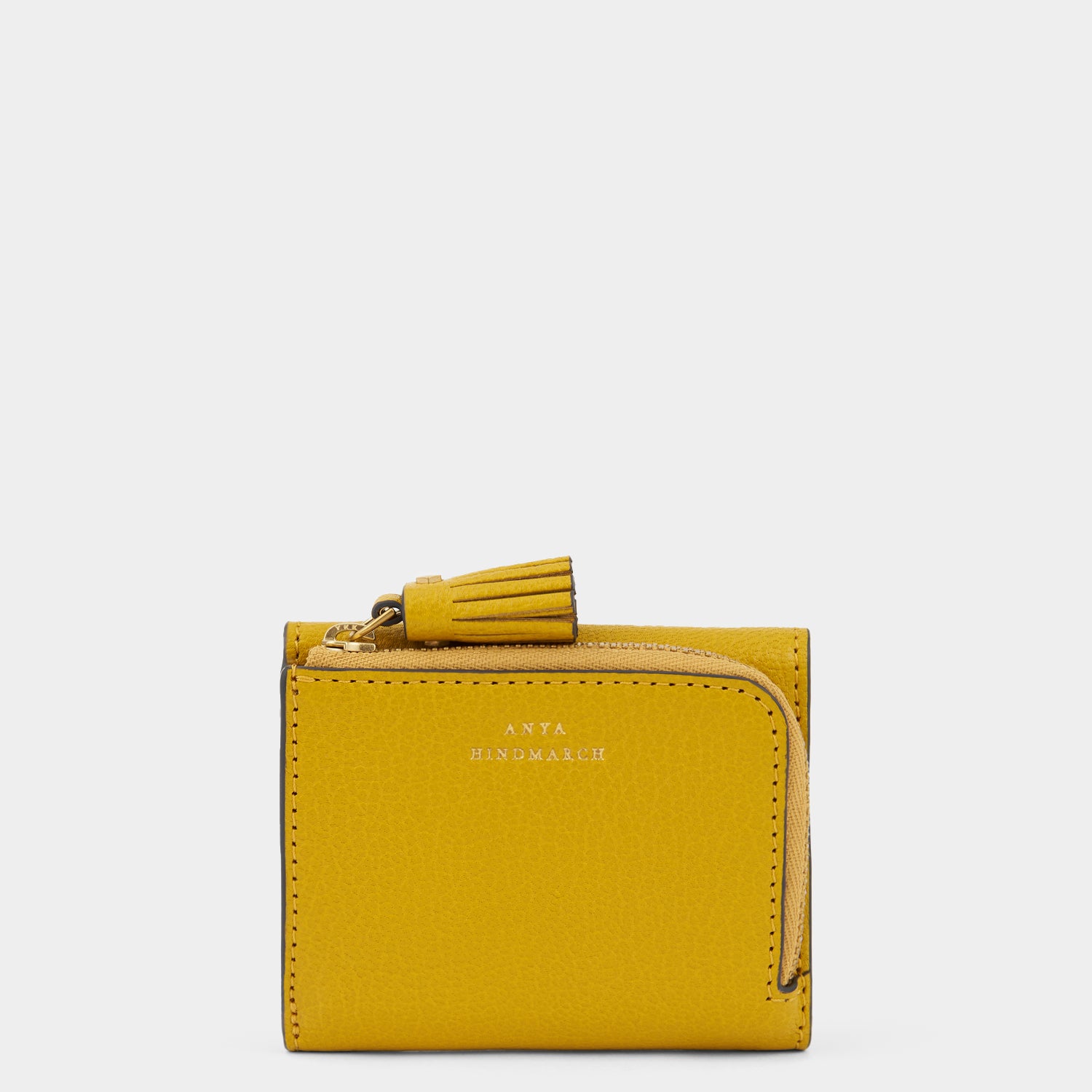 Peeping Eyes Mini Trifold Zip Wallet -

                  
                    Capra Leather in Mustard -
                  

                  Anya Hindmarch UK
