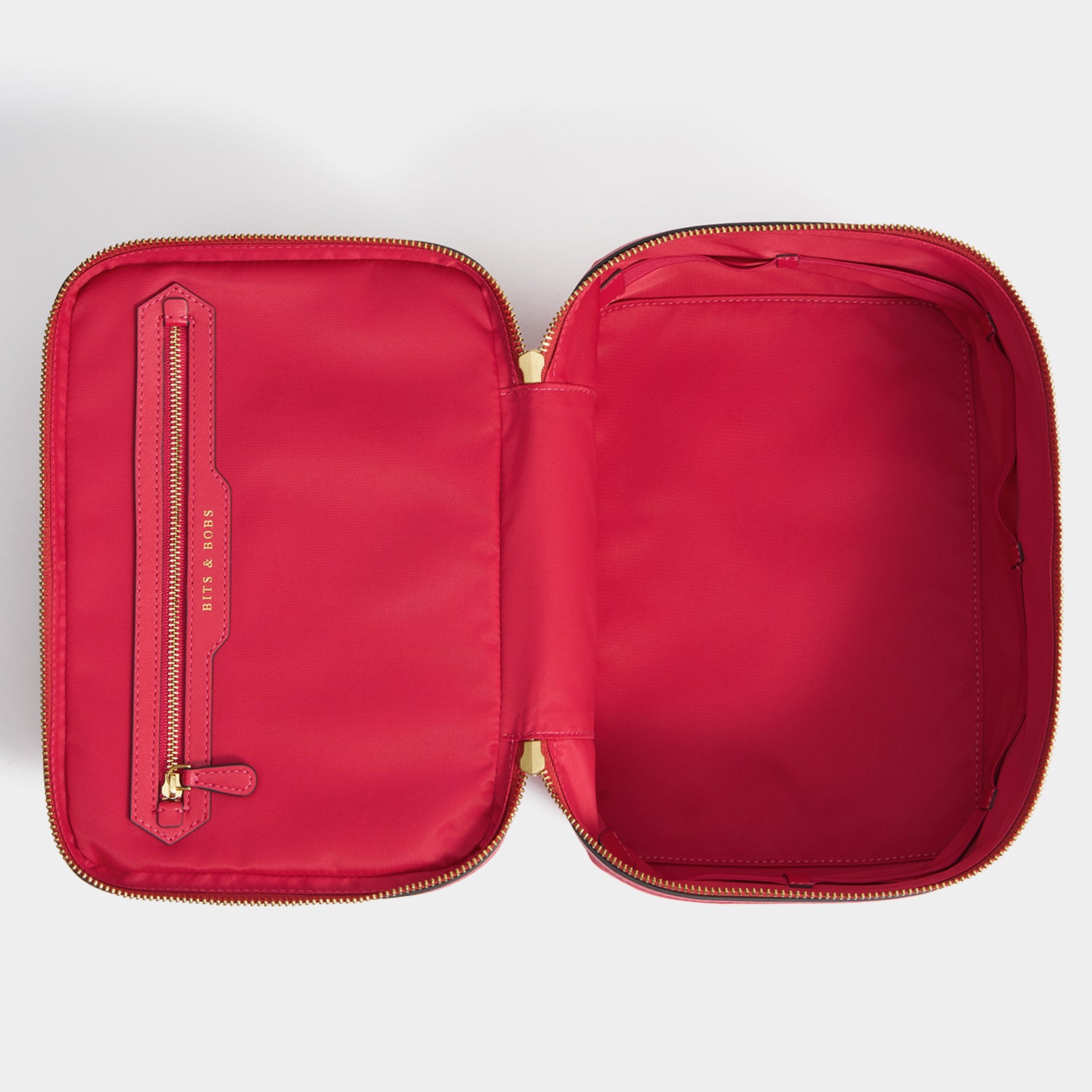 Logo Vanity Kit -

          
            Recycled Nylon in Magenta -
          

          Anya Hindmarch UK
