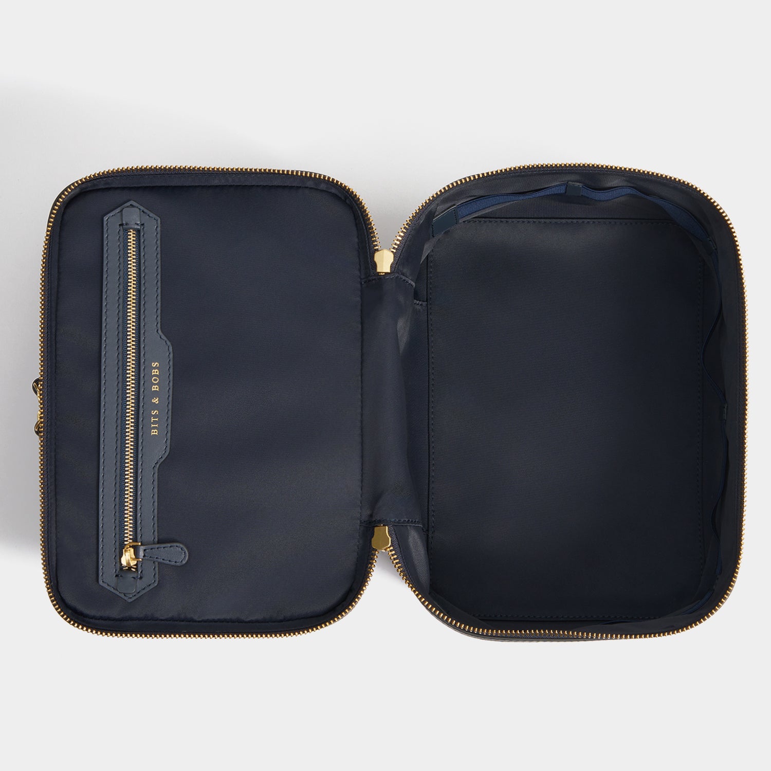 Logo Vanity Kit -

          
            Recycled Nylon in New Marine -
          

          Anya Hindmarch UK

