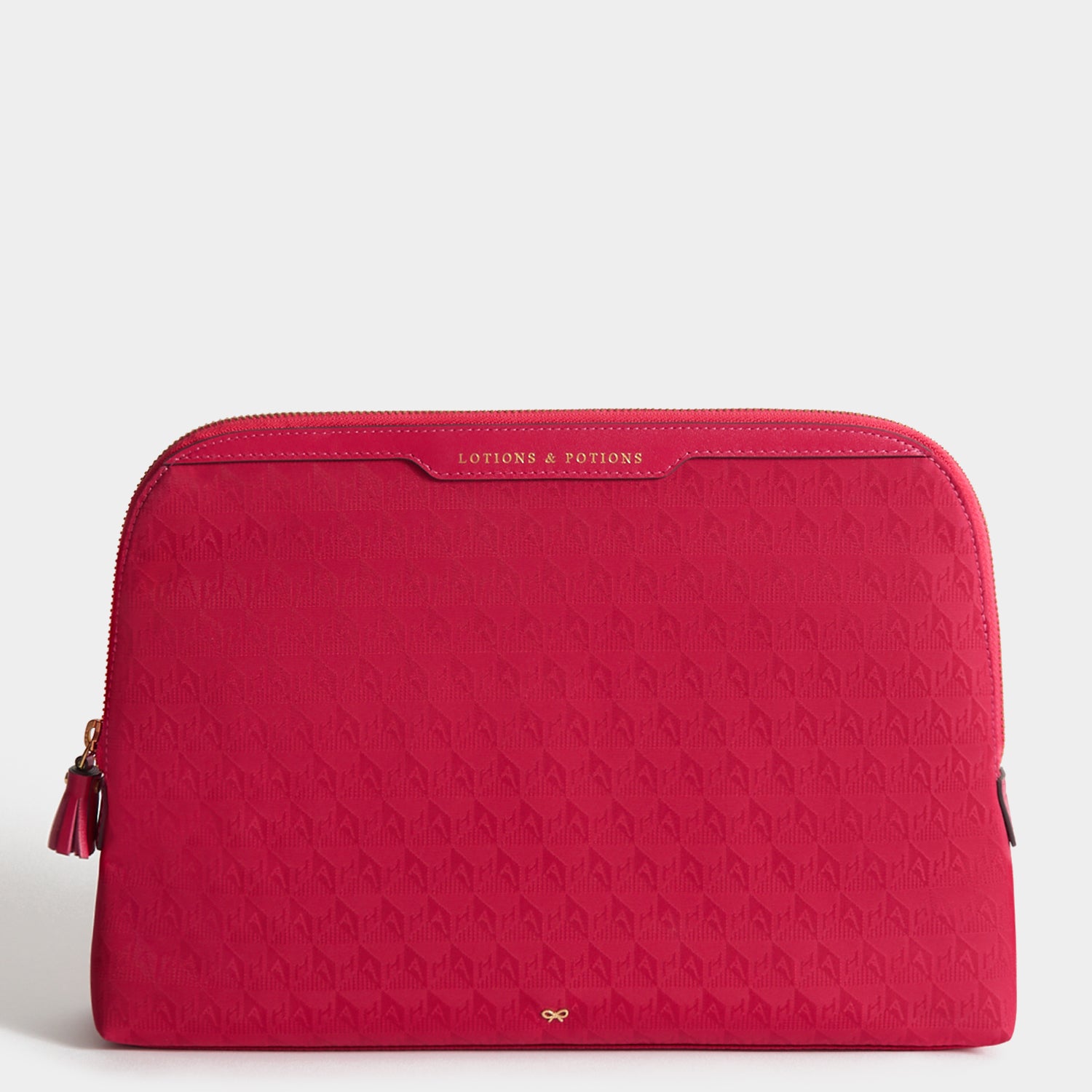 Logo Lotions and Potions Pouch -

          
            Jacquard Nylon Potions in Magenta -
          

          Anya Hindmarch UK
