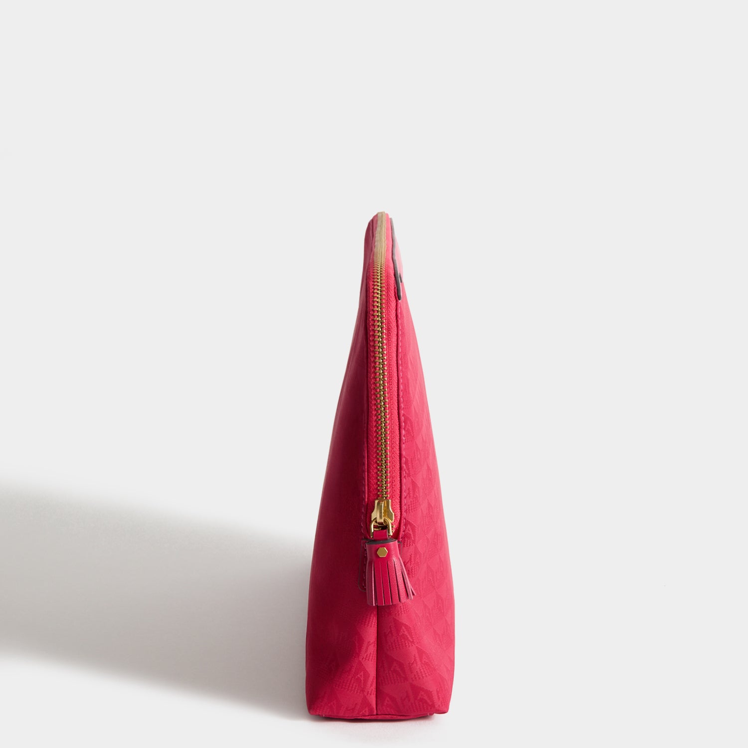 Logo Lotions and Potions Pouch -

          
            Jacquard Nylon Potions in Magenta -
          

          Anya Hindmarch UK
