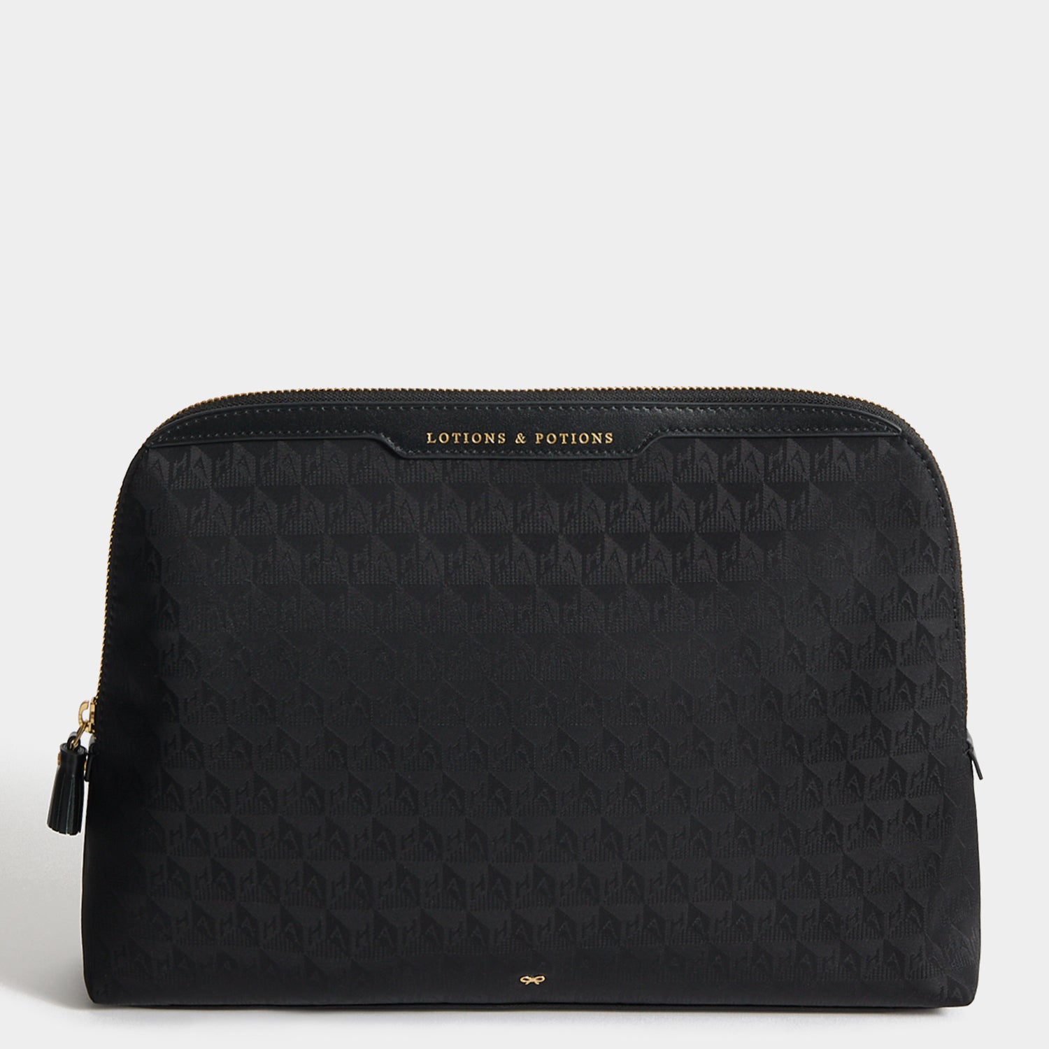 Logo Lotions and Potions Pouch -

          
            Recycled Nylon in Black -
          

          Anya Hindmarch UK
