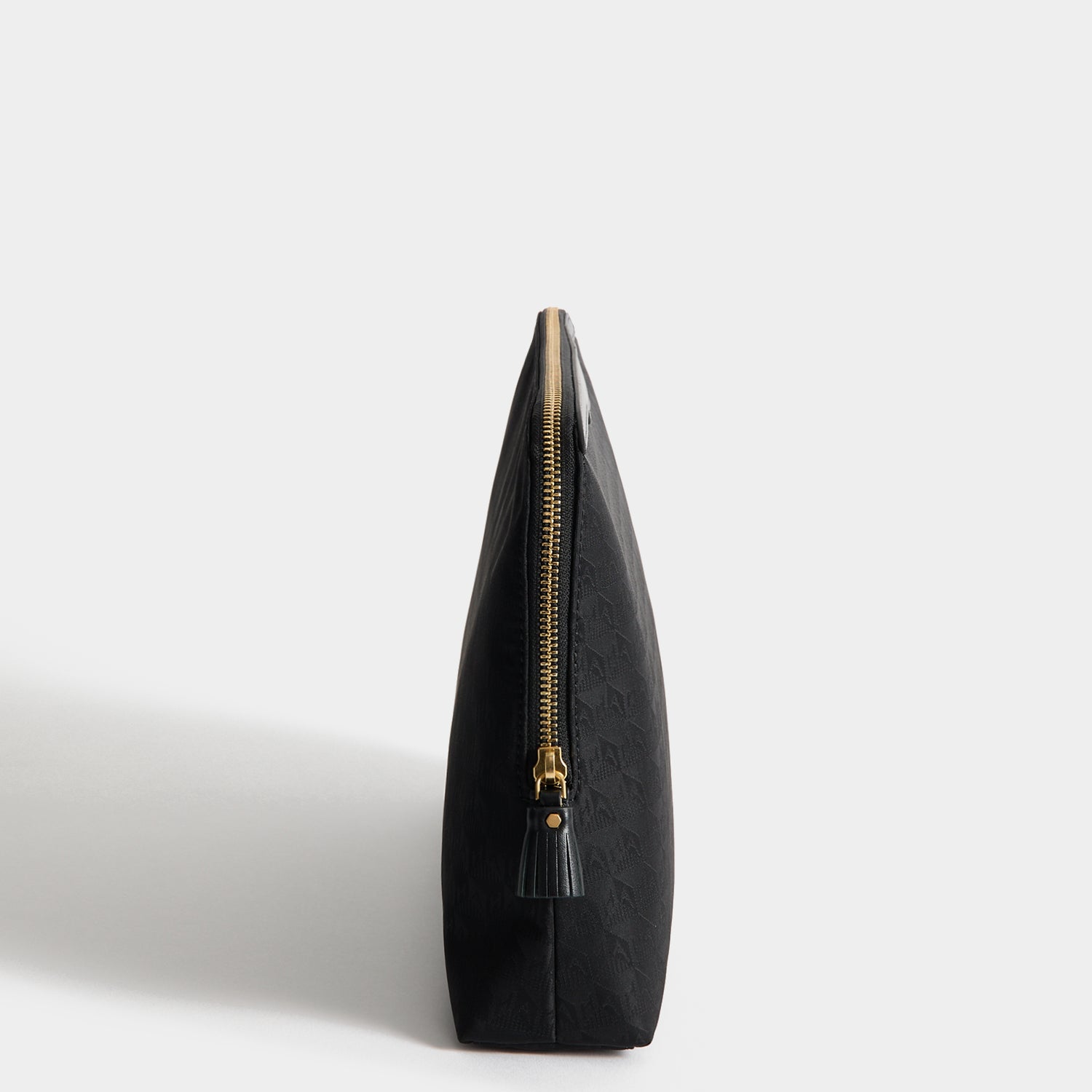 Logo Lotions and Potions Pouch -

          
            Recycled Nylon in Black -
          

          Anya Hindmarch UK
