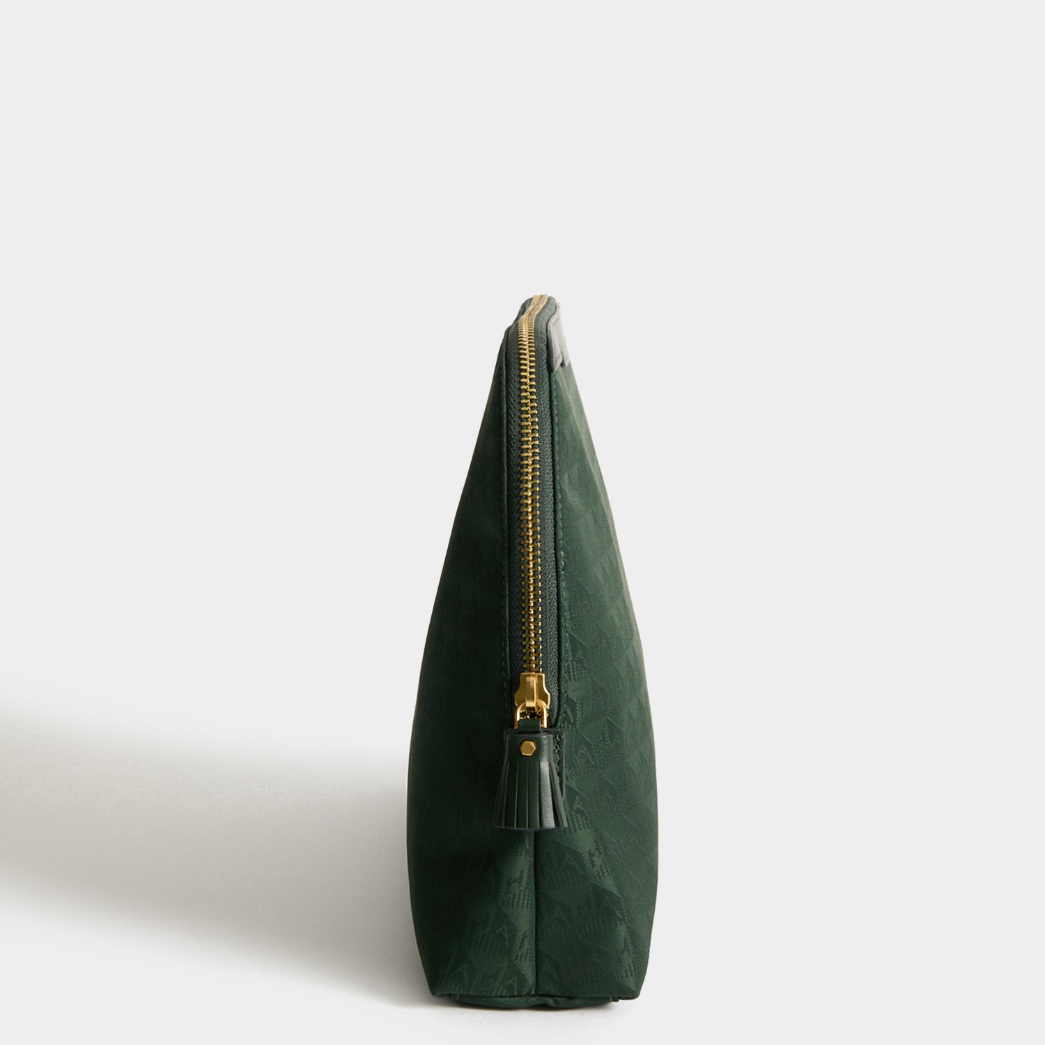 Logo Lotions and Potions Pouch -

          
            Jacquard Nylon in Dark Holly -
          

          Anya Hindmarch UK
