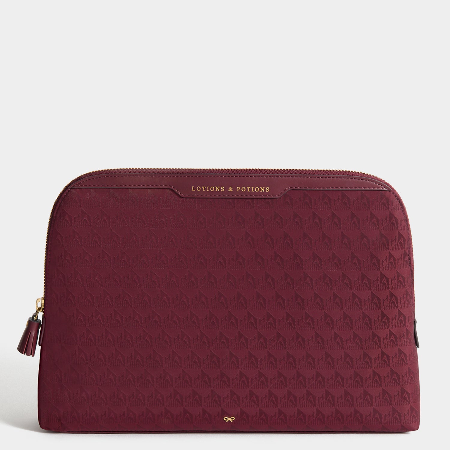 Logo Lotions and Potions Pouch -

          
            Jacquard Nylon in Medium Red -
          

          Anya Hindmarch UK
