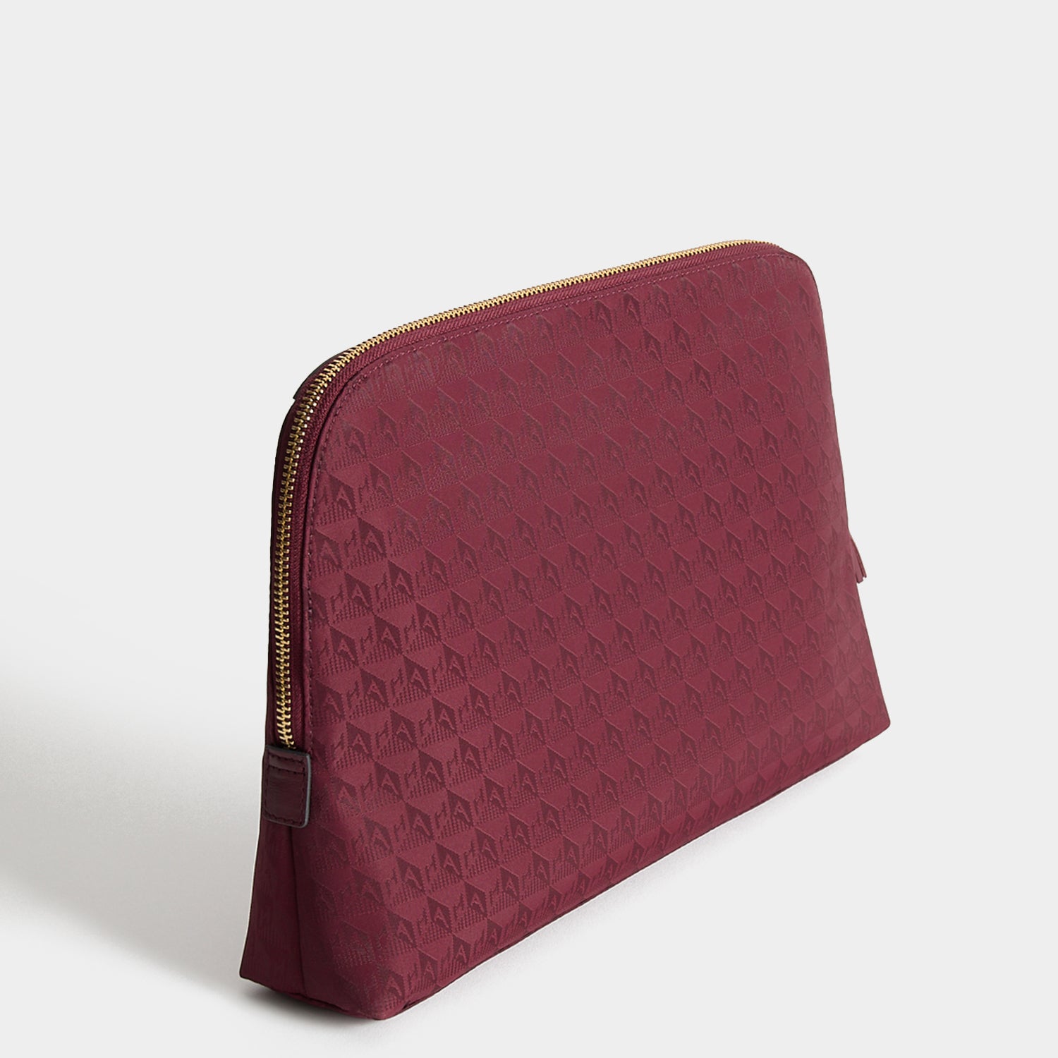 Logo Lotions and Potions Pouch -

          
            Jacquard Nylon in Medium Red -
          

          Anya Hindmarch UK
